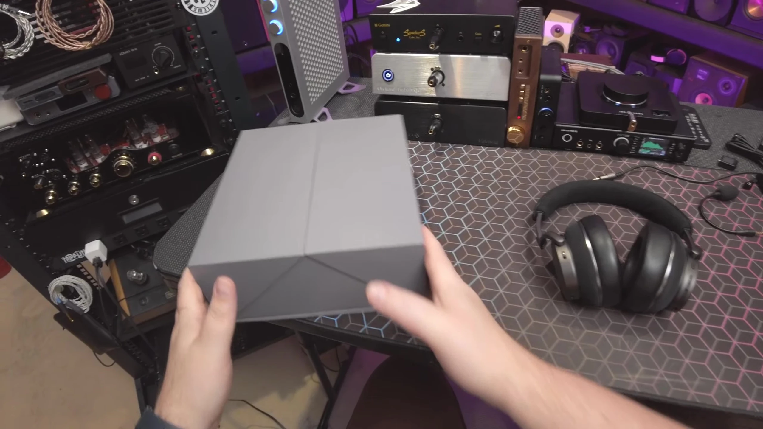 The Noble Apollo headphones in their clamshell-style box.