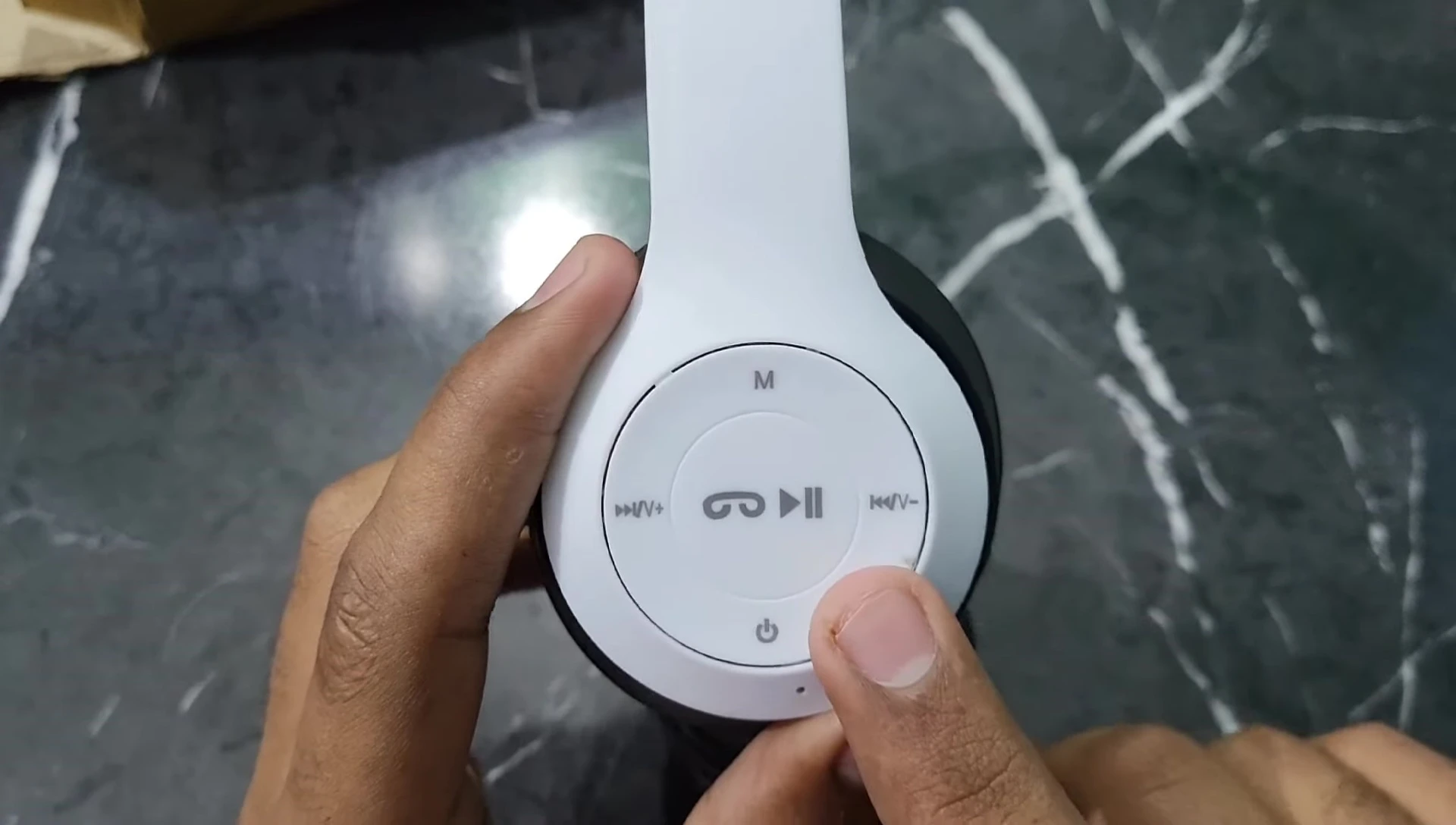The control buttons on the right earcup.