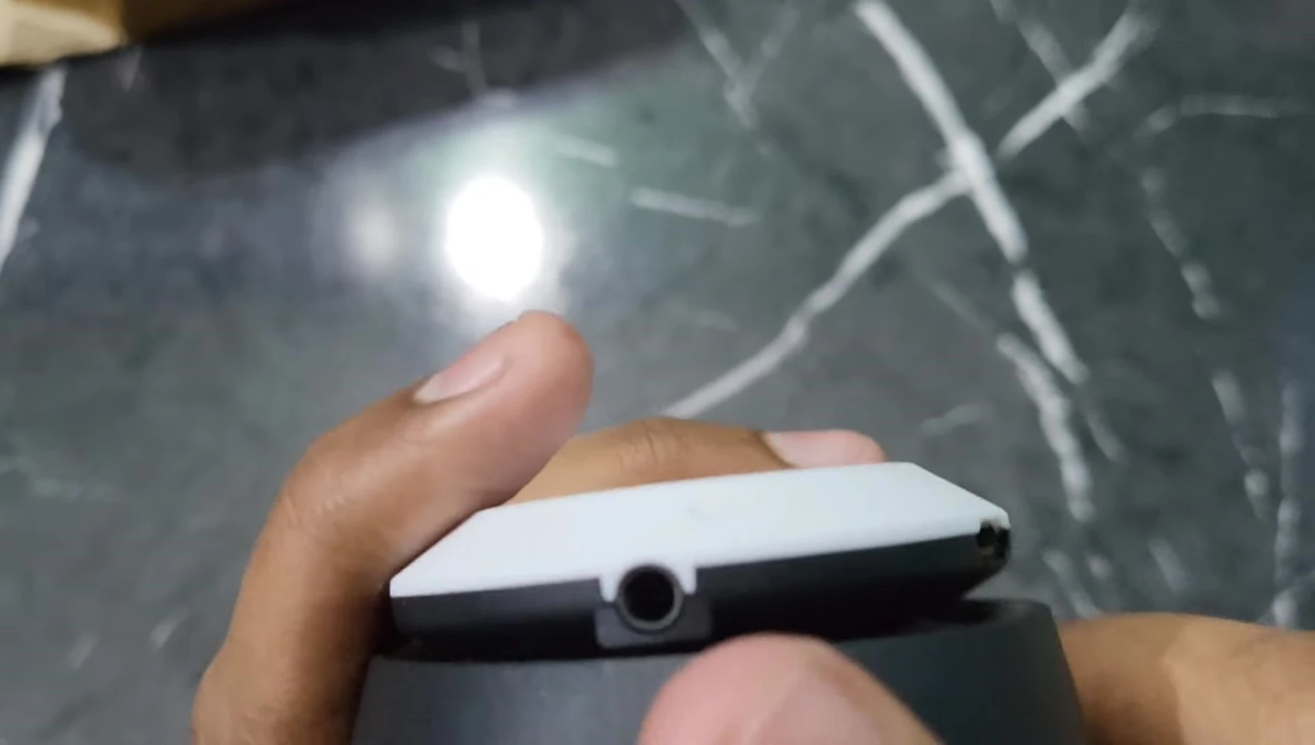 The 3.5mm aux input and microSD card slot.