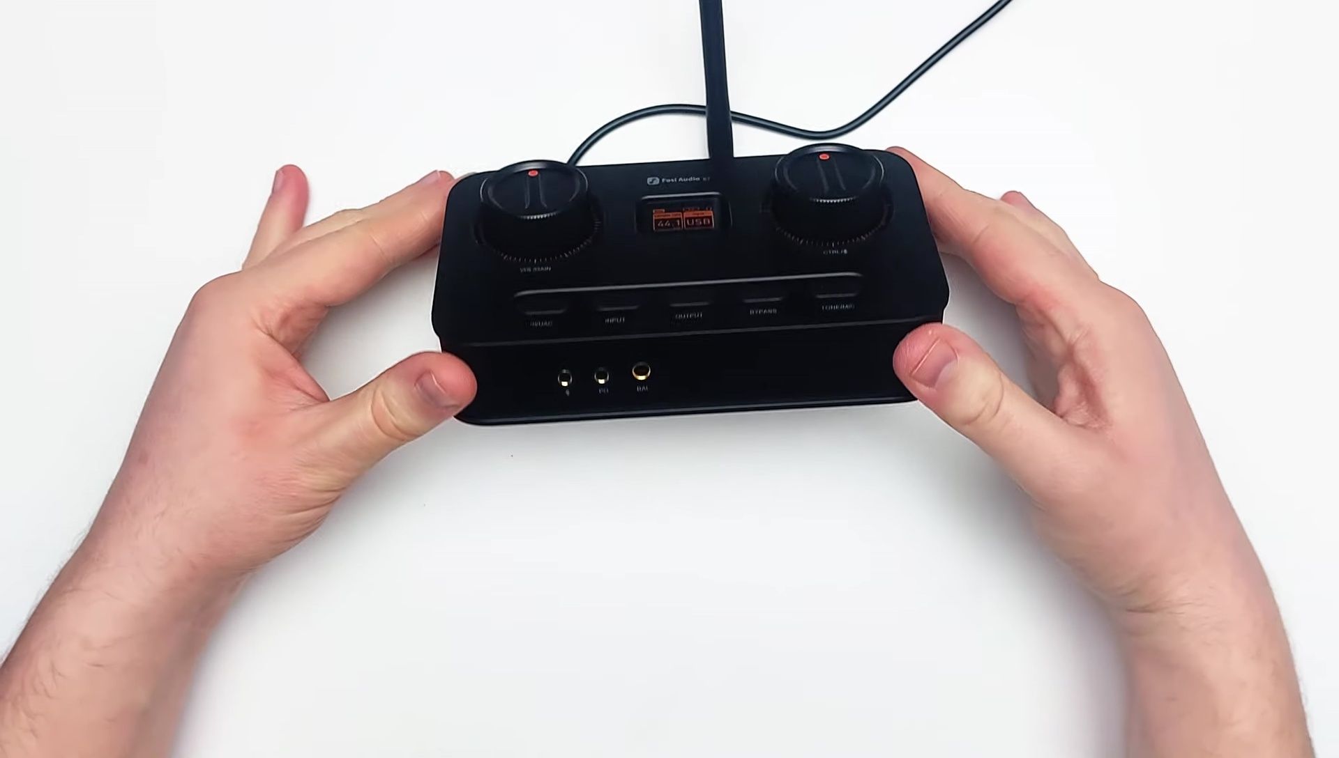 The front panel of the K7, highlighting the headphone outputs and microphone input.