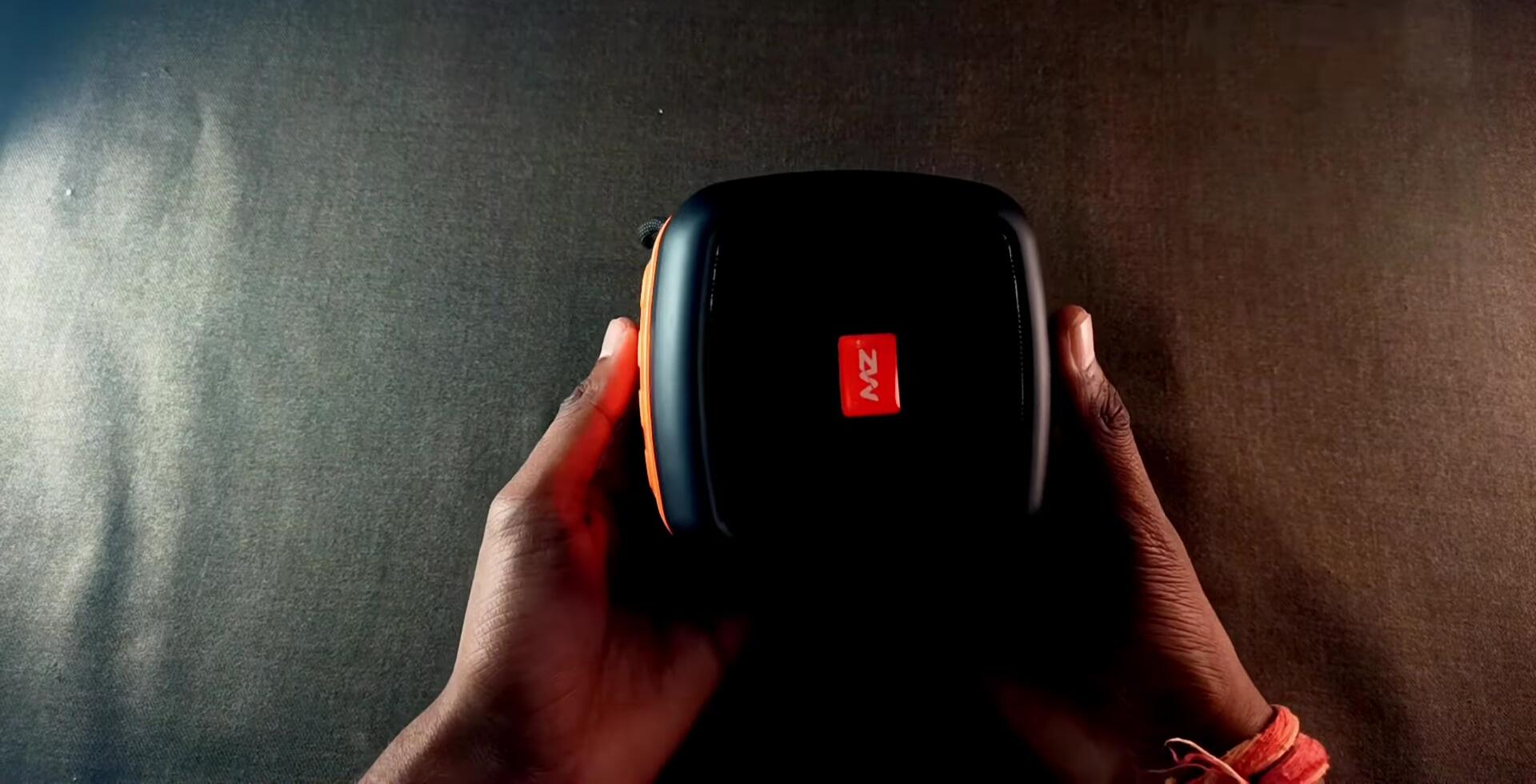 Close-up of the speaker, showcasing its size and design.