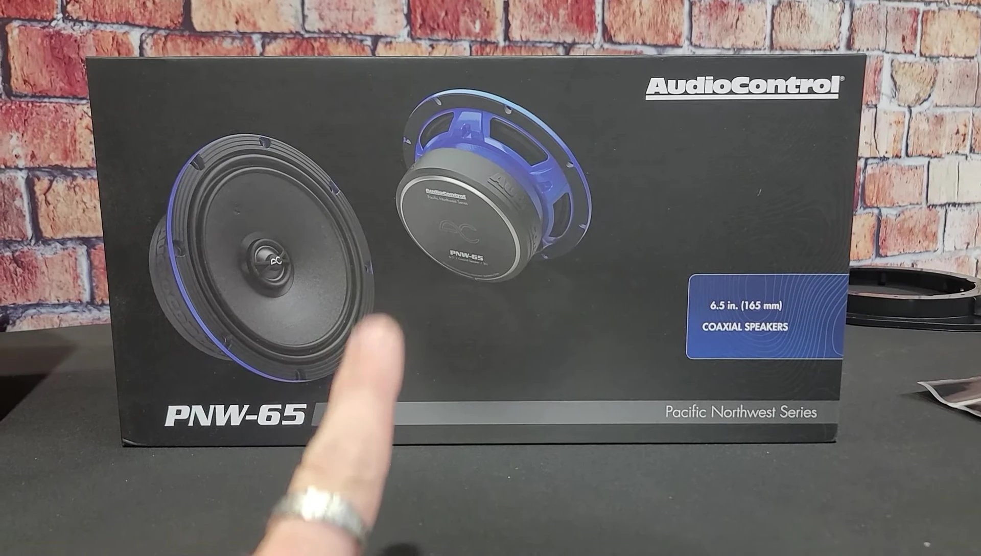 Close-up of the AudioControl PNW-65 coaxial speakers in their packaging