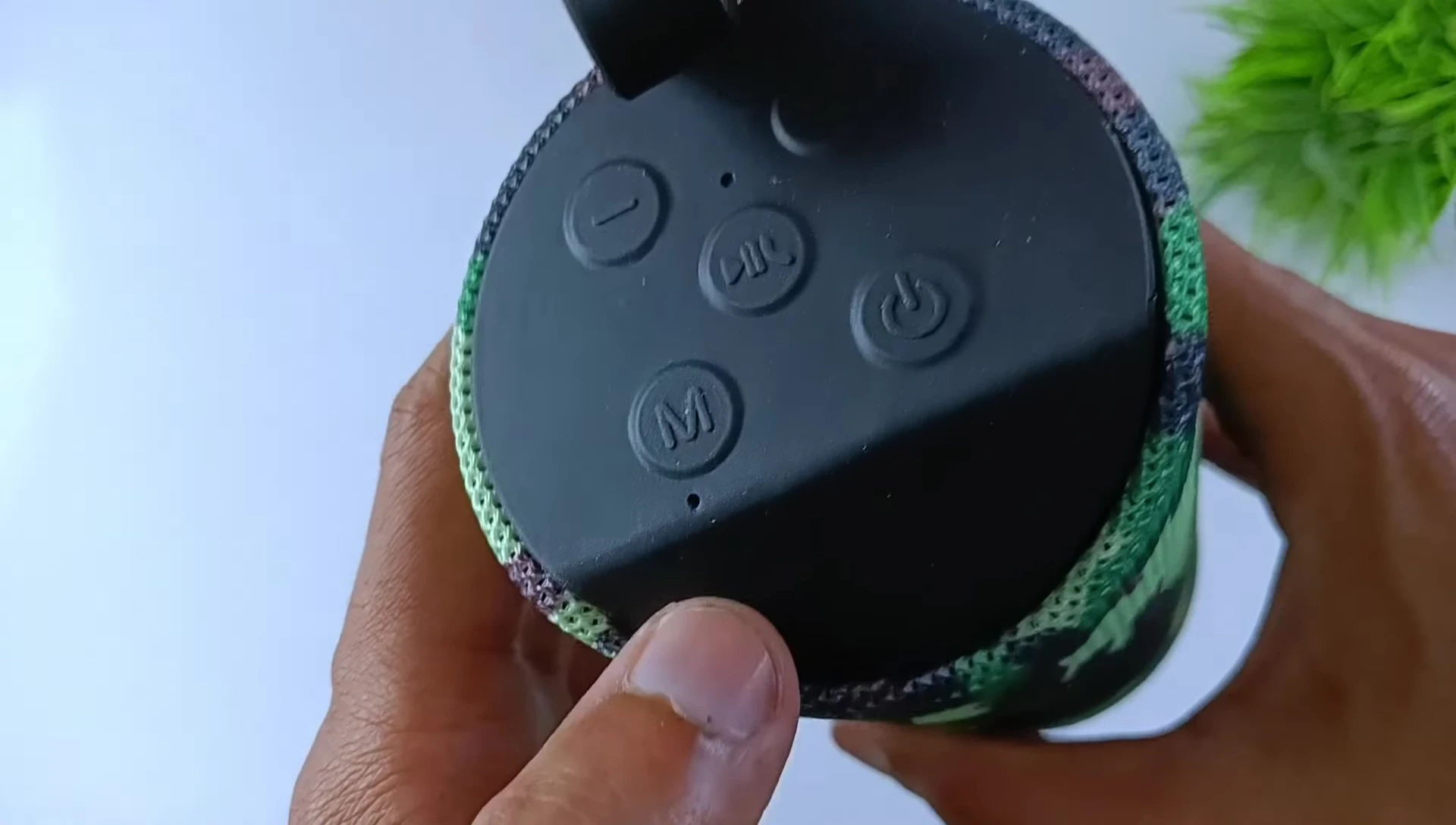 Close-up of the speaker's LED indicator.