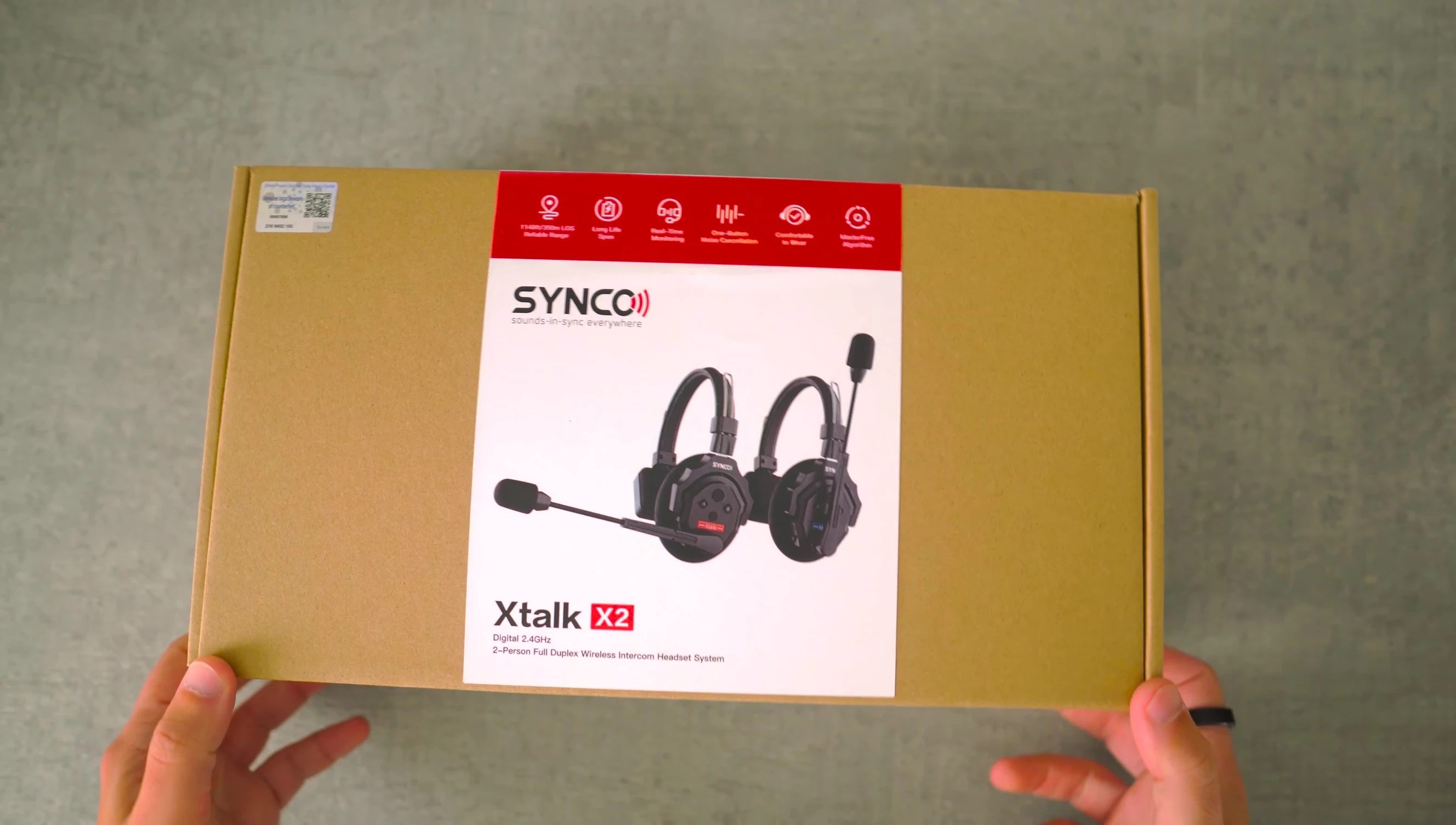 Unboxing the SYNCO XTalk X2, showing the contents.