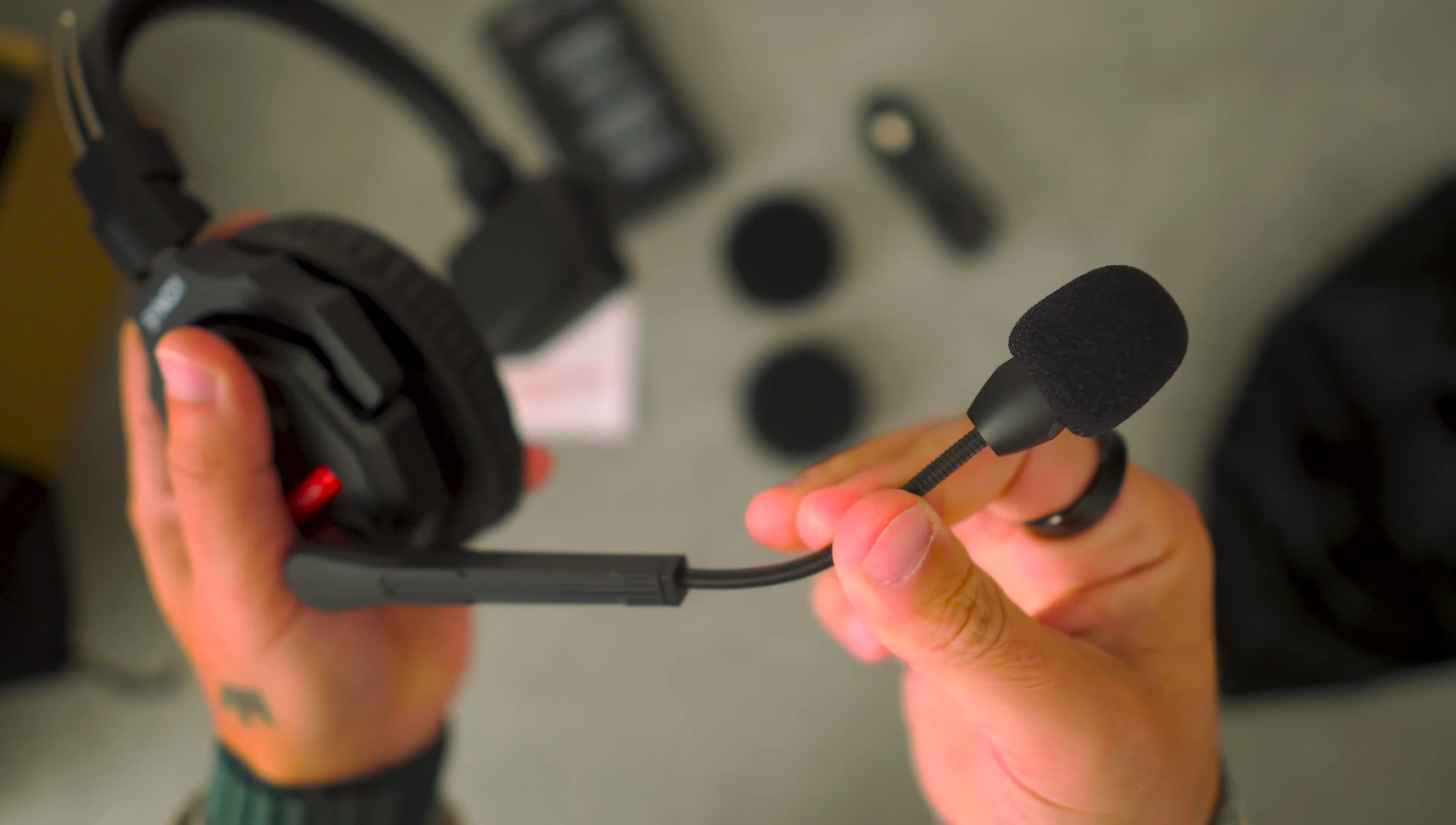 Close-up showcasing the microphone and the battery compartment.