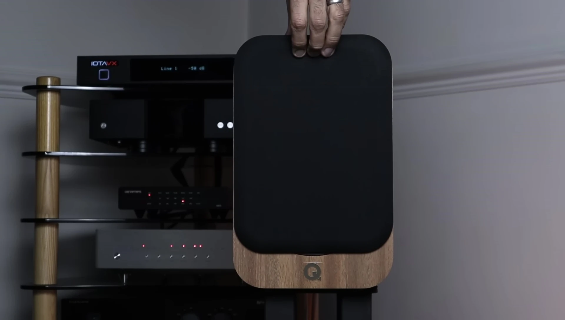 Close-up view of the speaker drivers, highlighting the tweeter and mid-woofer.