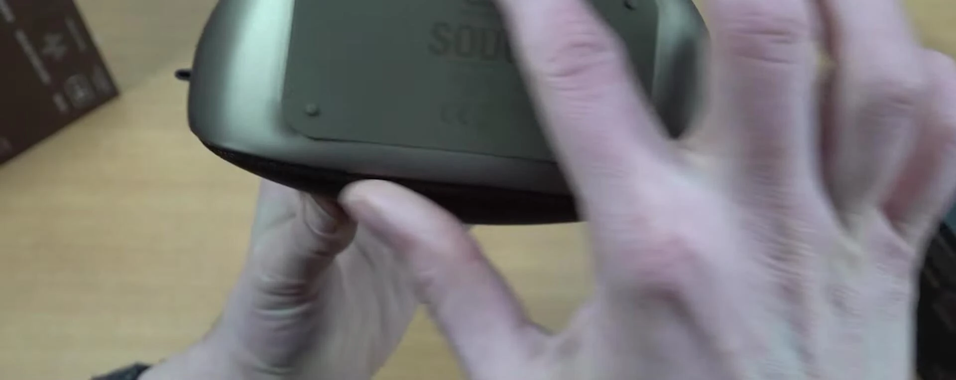 Bottom of the speaker showing the rubber mat