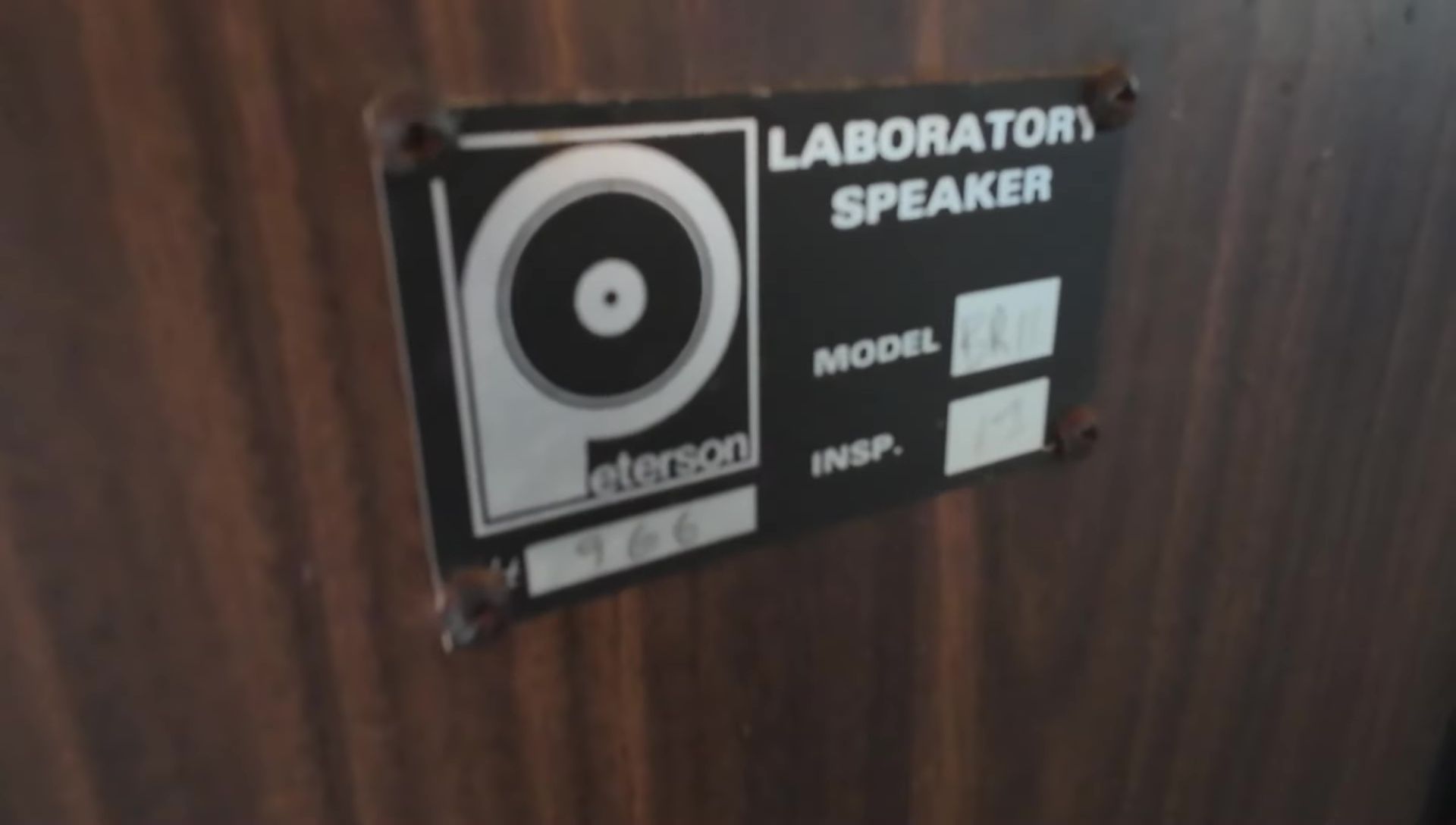 Close up of the serial number sticker on the speaker.