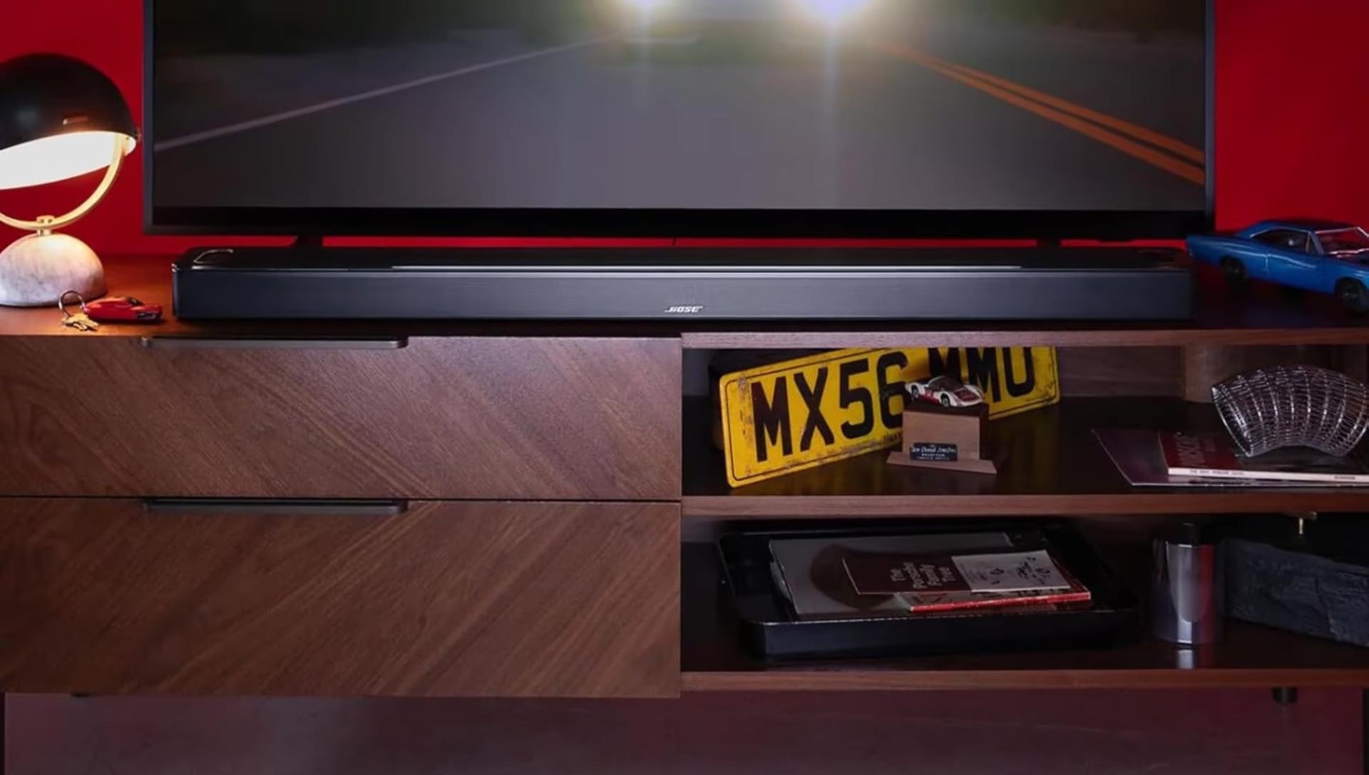 Image showing Bose headphones connected to the soundbar for private listening