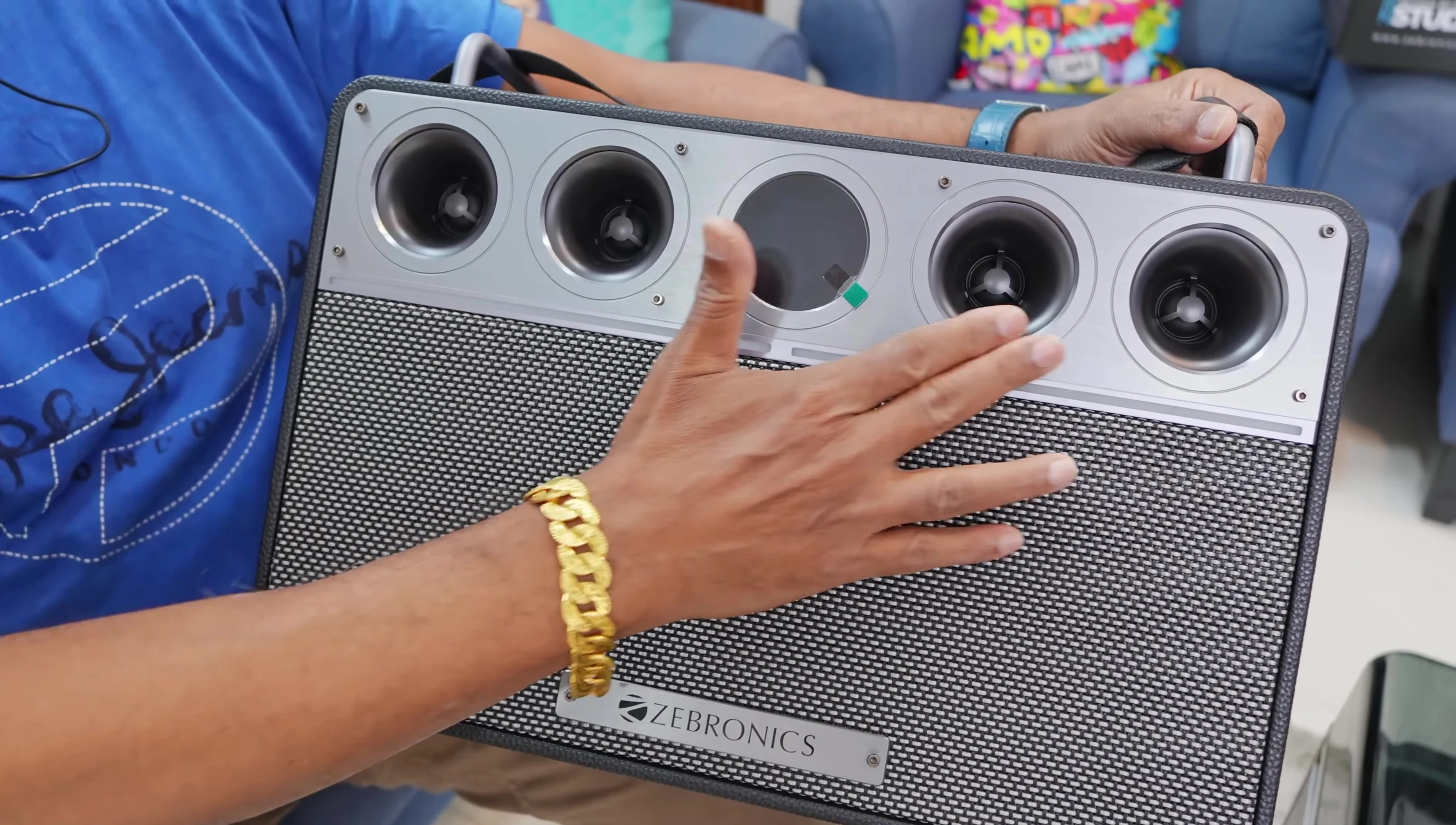Close-up of the speaker's drivers and LED display