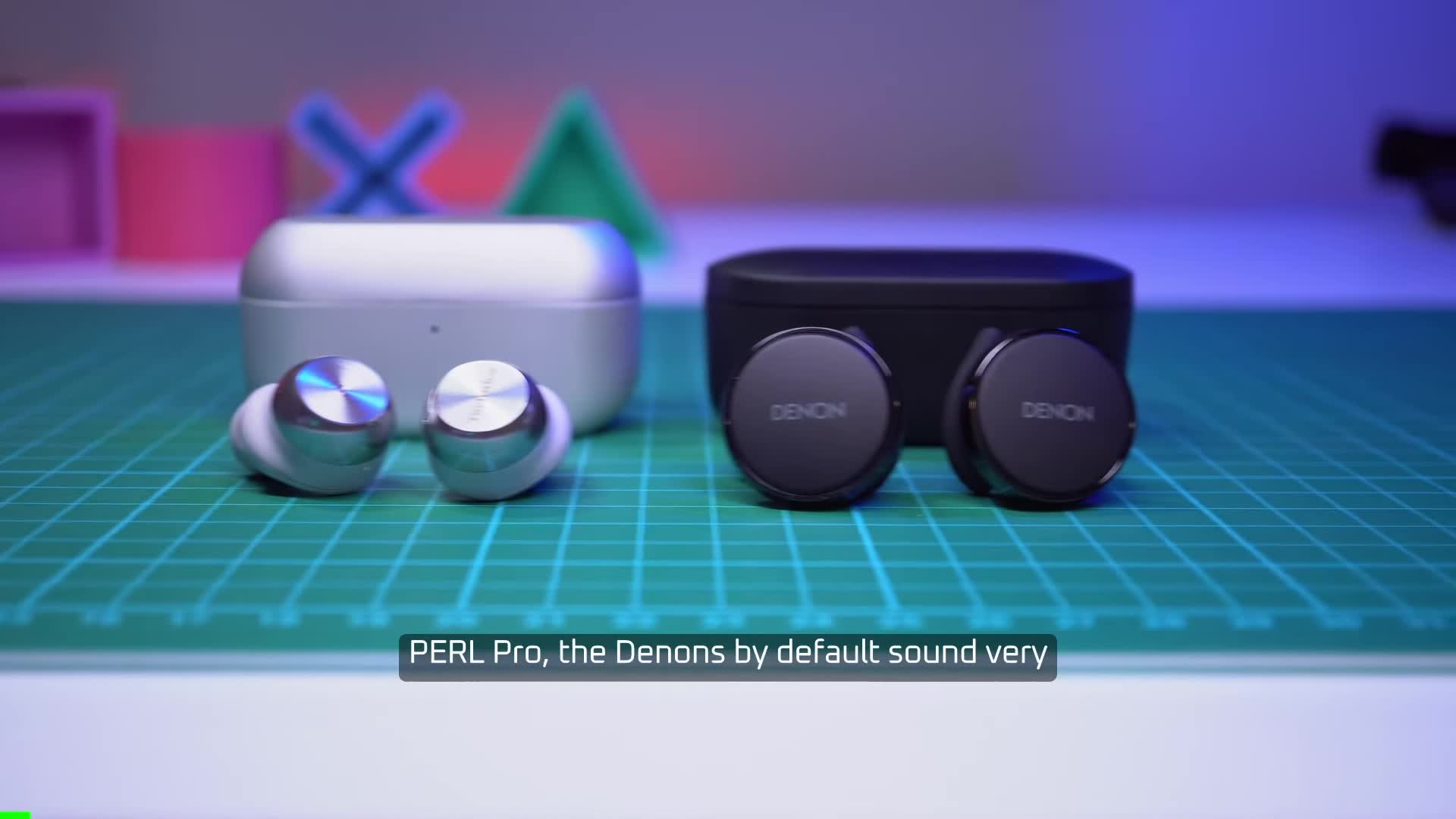 Close-up of the Denon PERL Pro earbuds