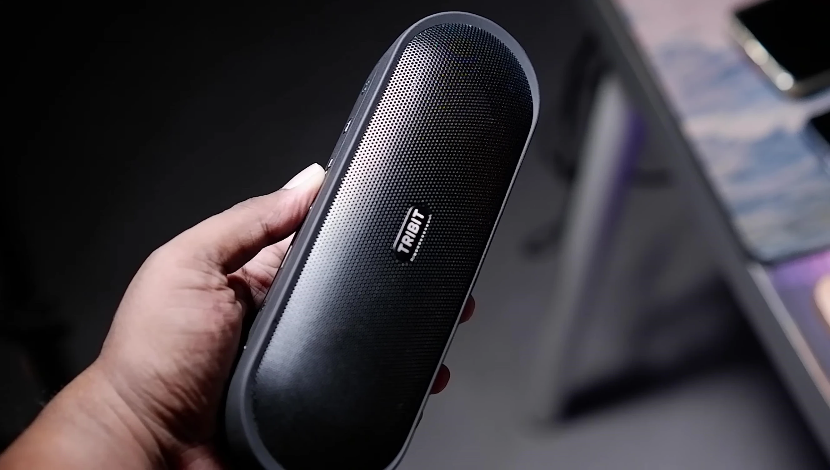 Shot showing the back of the speaker with the flap covers