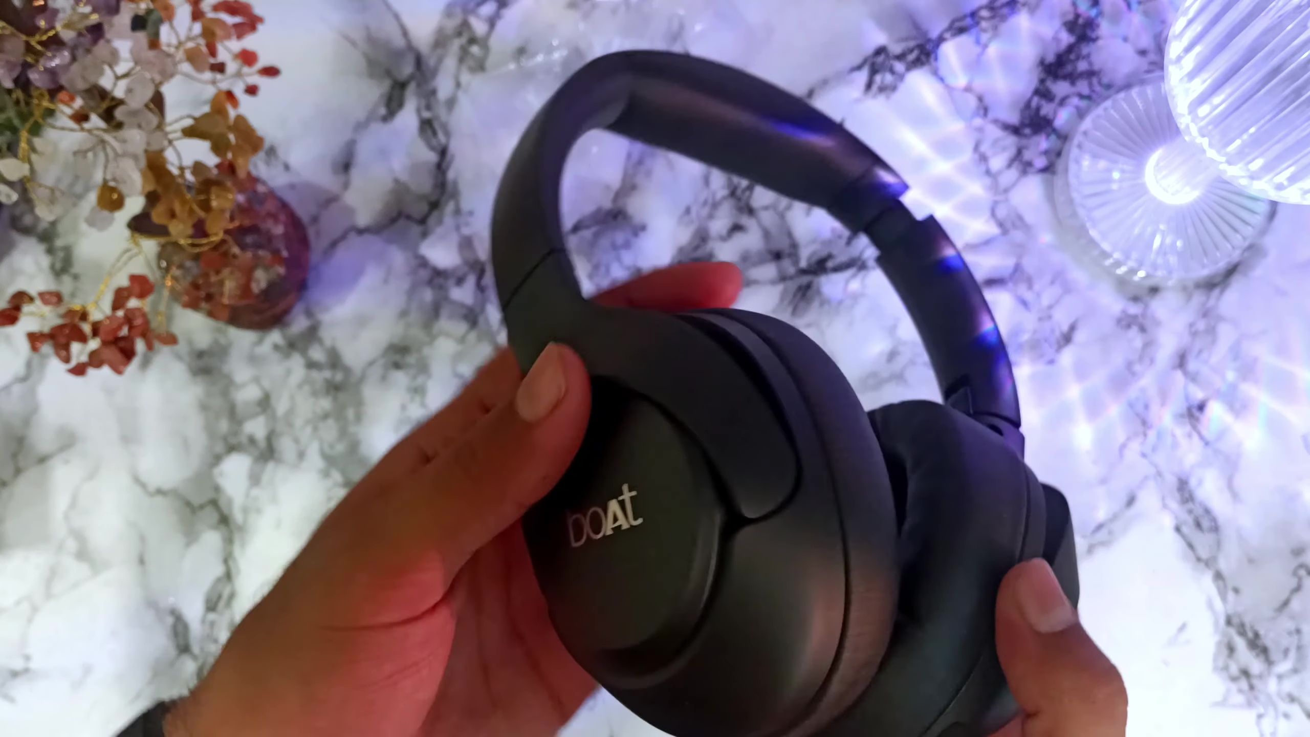 Headphones showing foldable earcups.