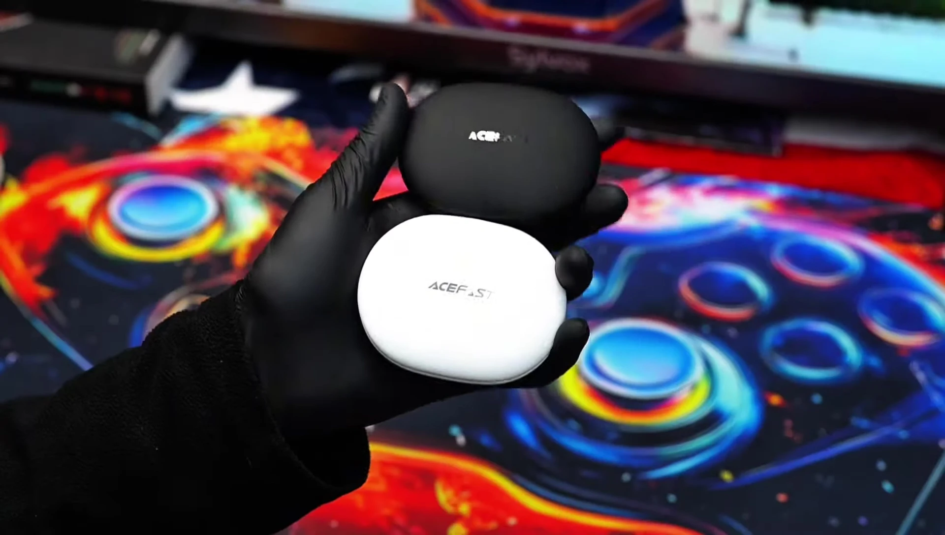 White and black AceFit Air headphones