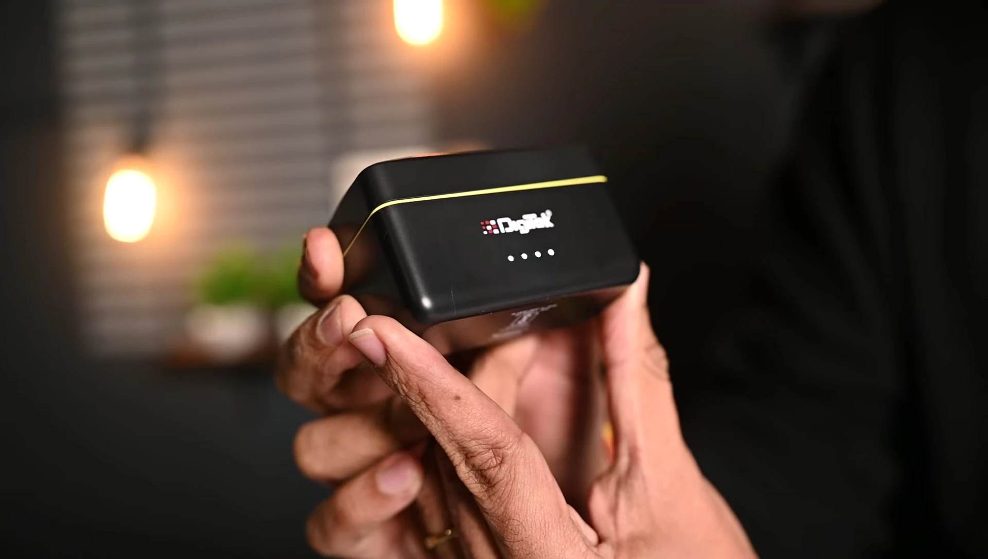Close-up view of the charging case, highlighting the Type-C charging port and battery indicator.
