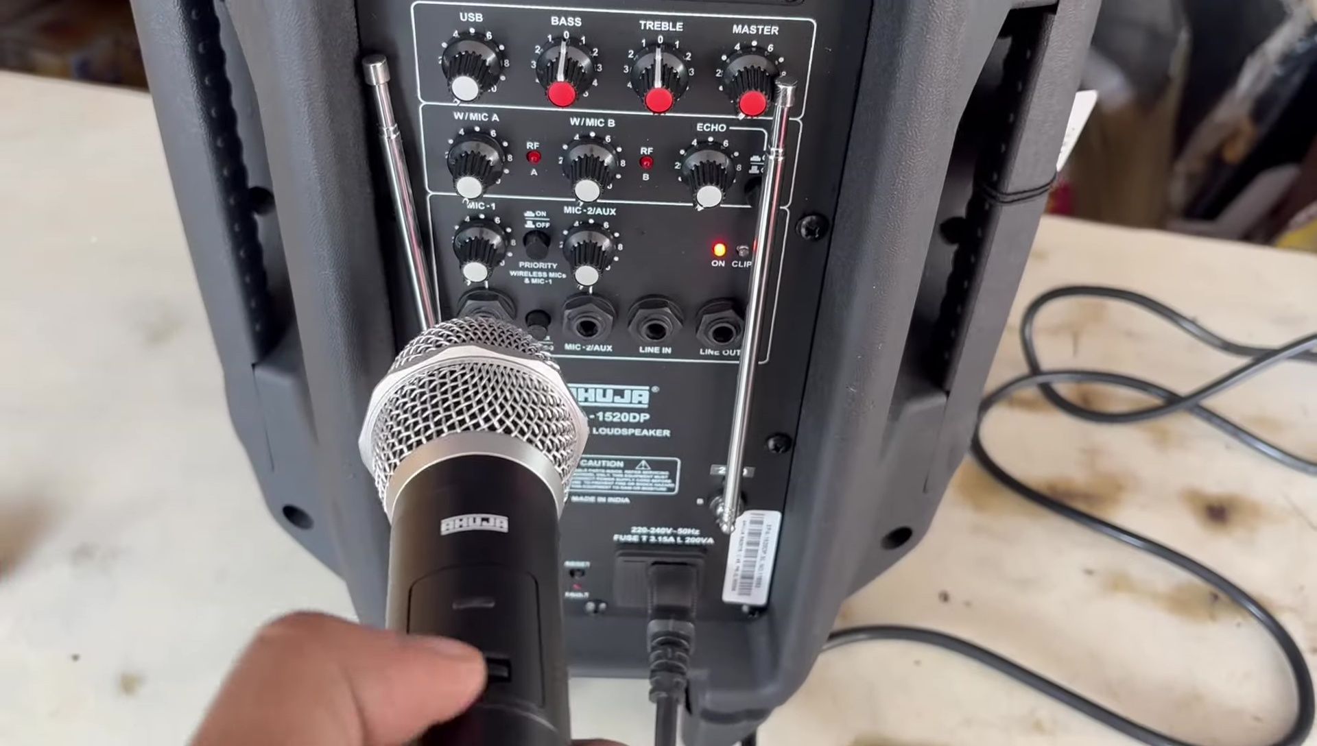 Testing the speaker's sound quality.