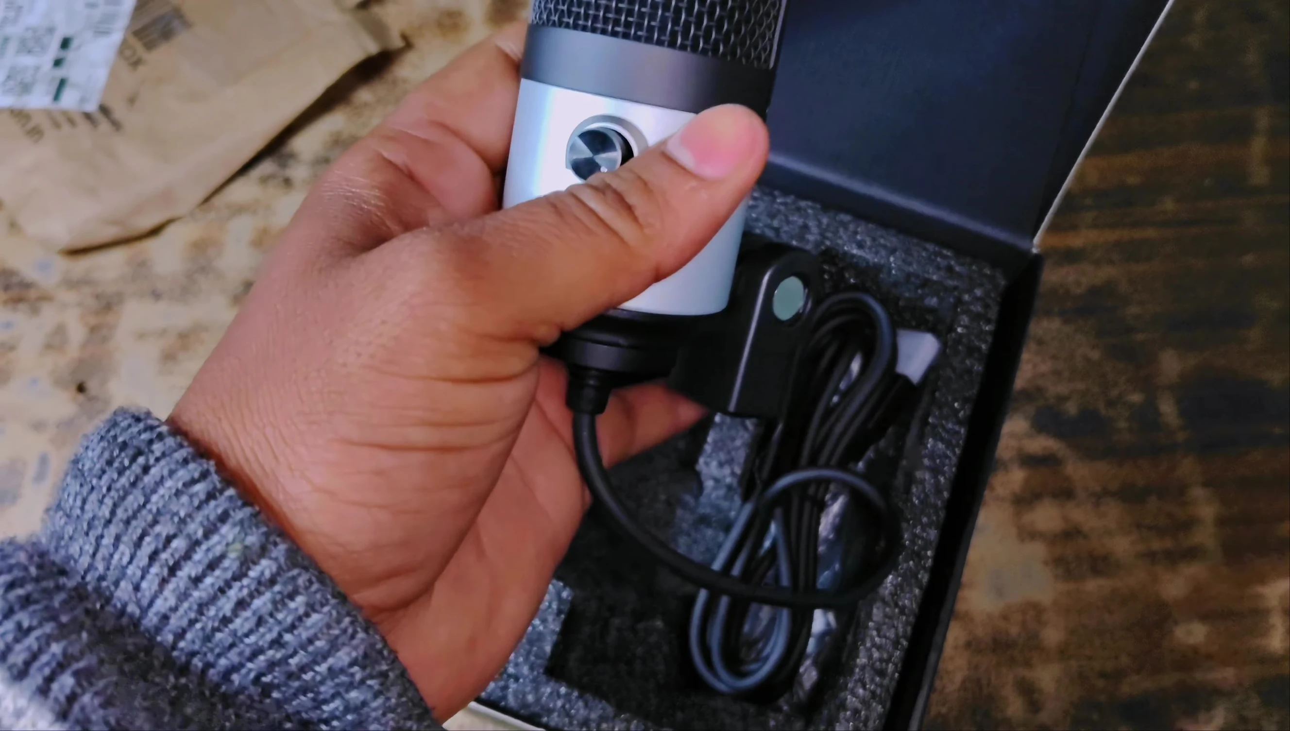 Close-up showing the metal construction of the microphone