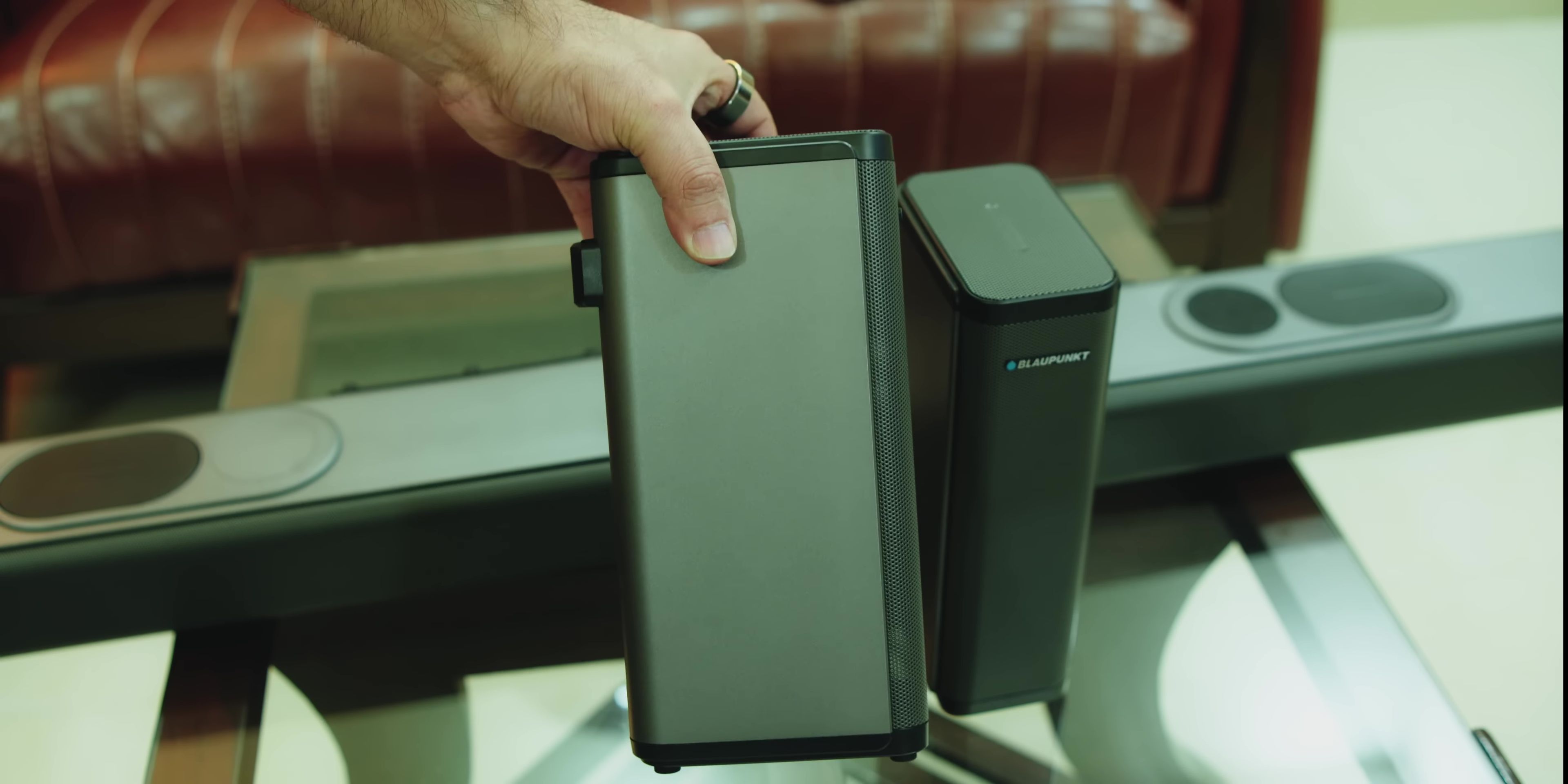 The rear wireless speakers.