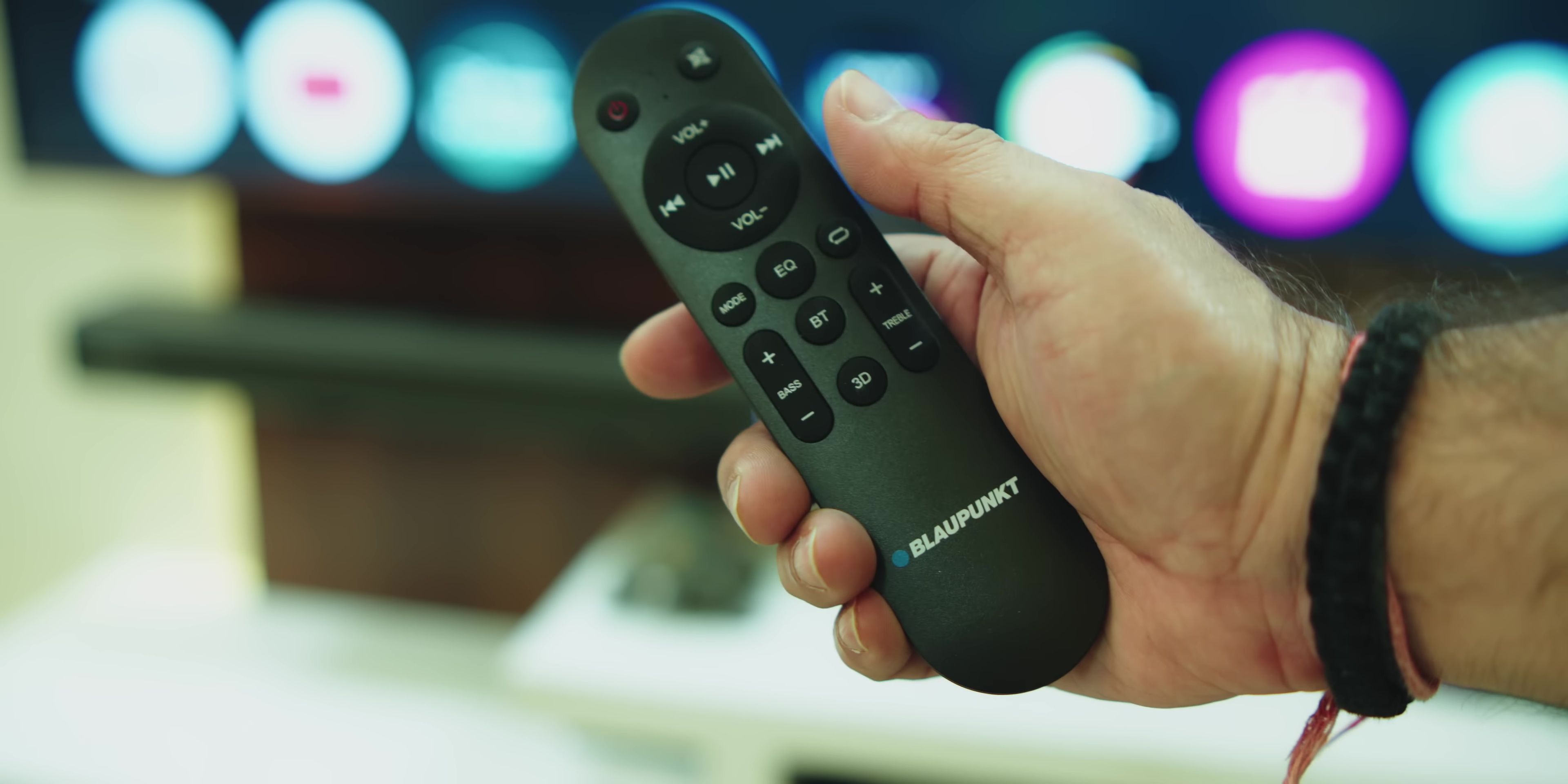 Soundbar user interface showing EQ settings.