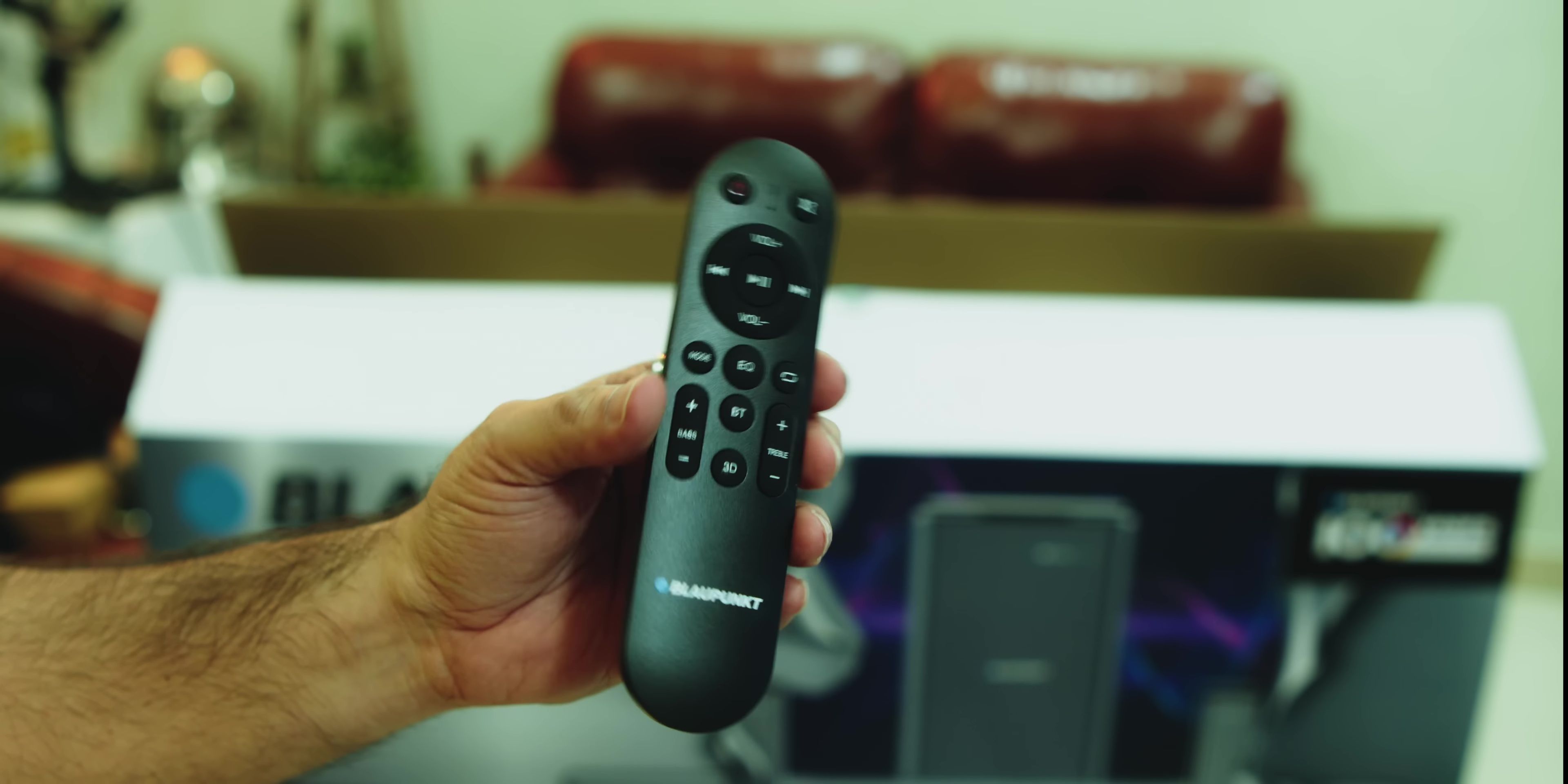 Close-up of the remote control and its packaging.