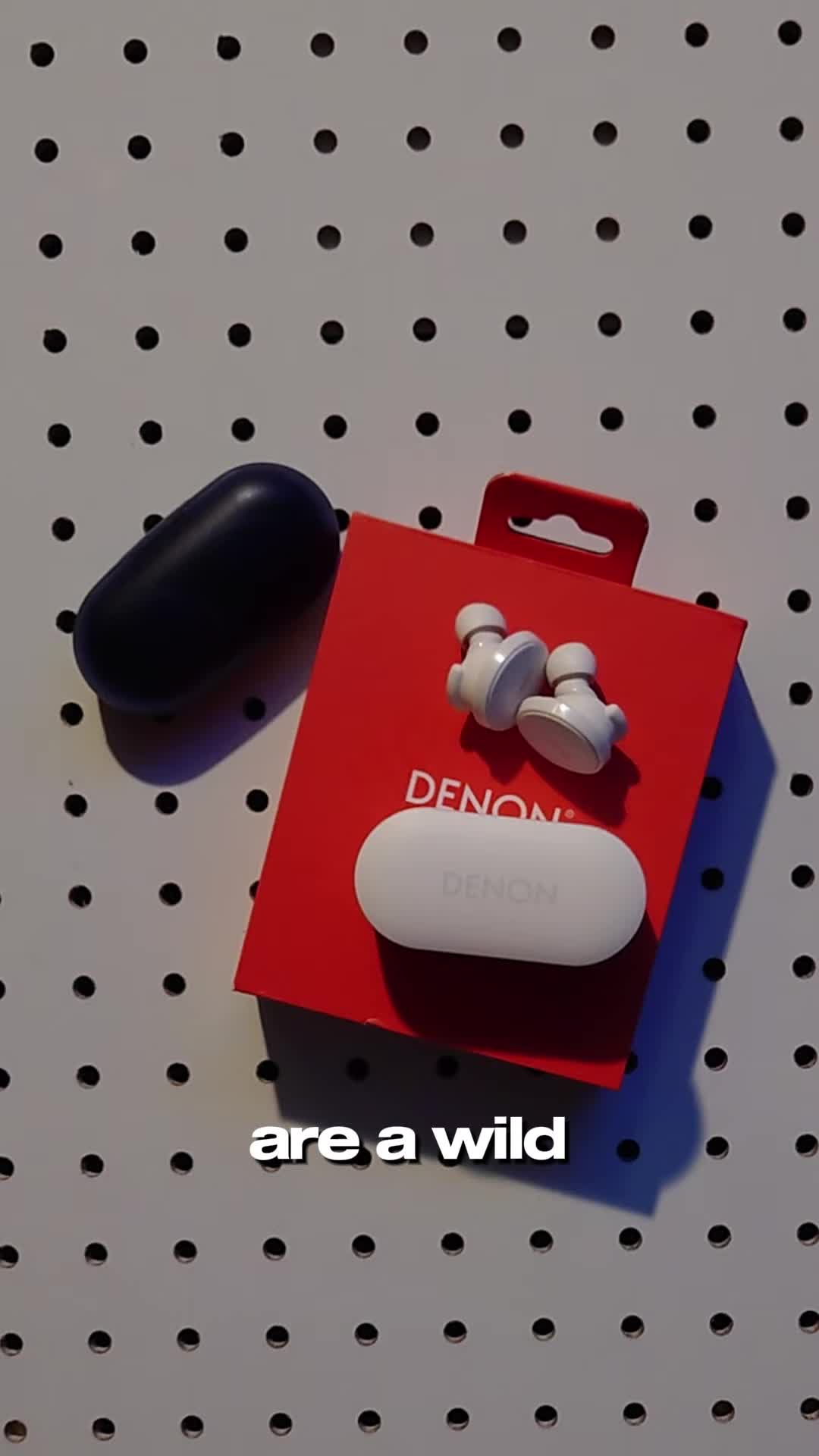 Close-up of the Denon Pearl Pro earbuds