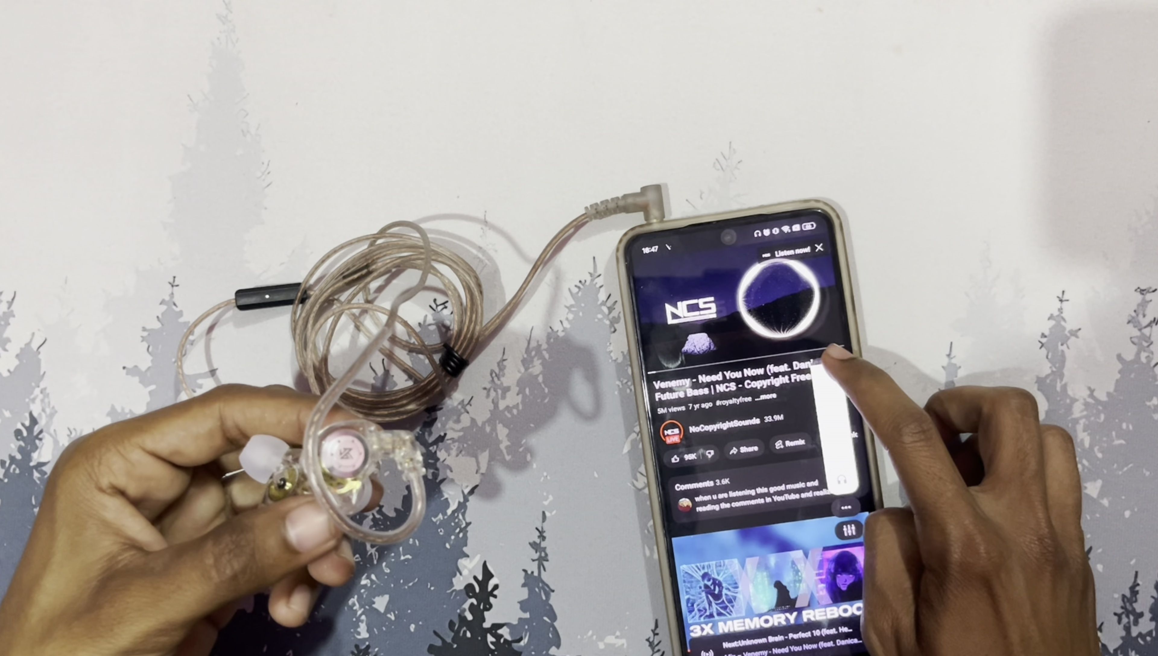The reviewer testing the sound quality