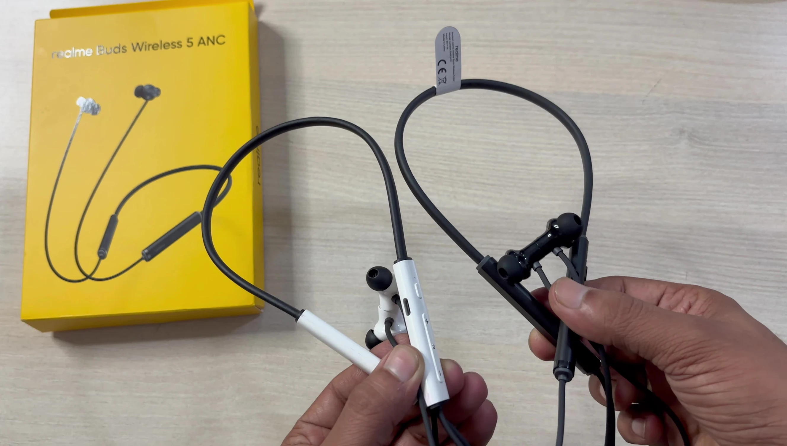 Close-up shot of the Realme Buds Wireless 5 ANC earbuds
