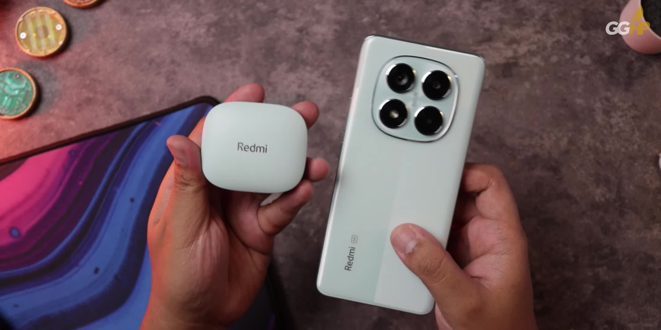 Earbuds removed from the case, showcasing the design
