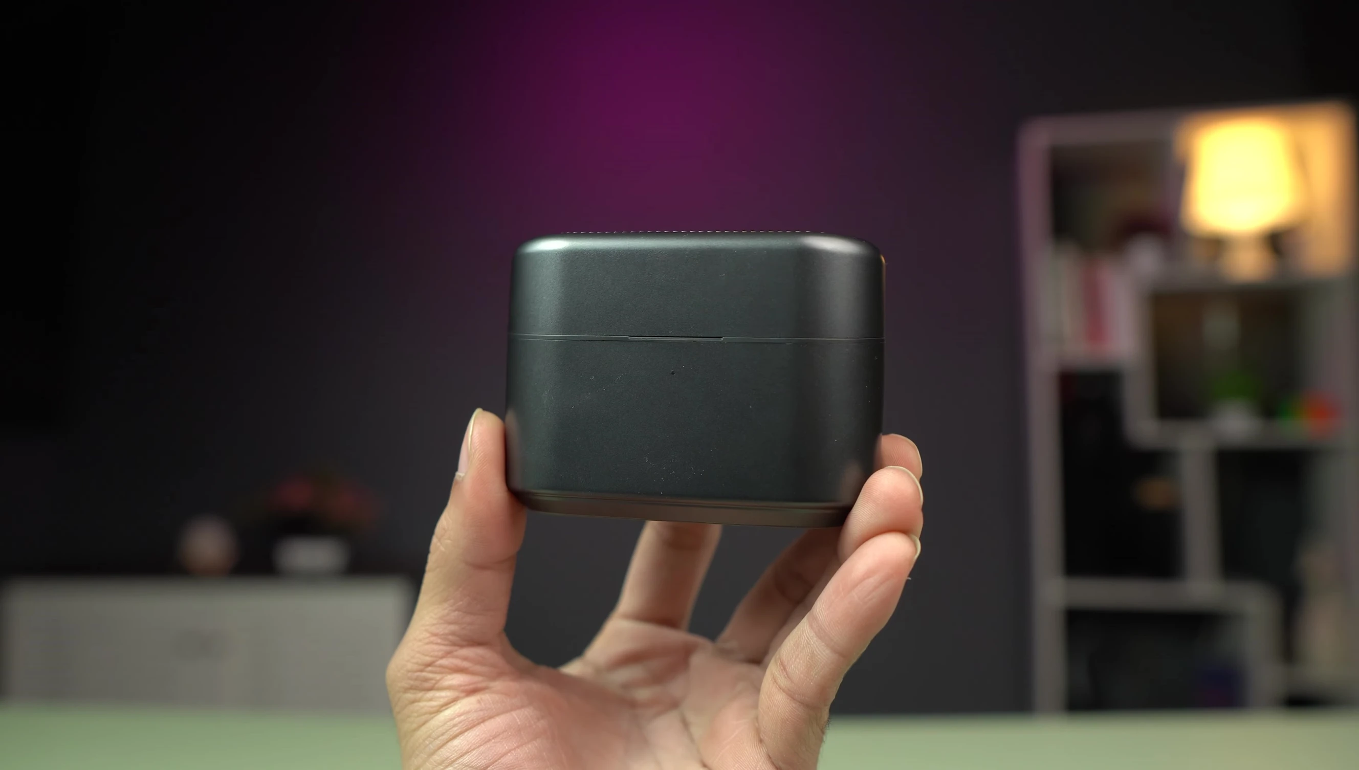 The charging case with branding and charging indicator