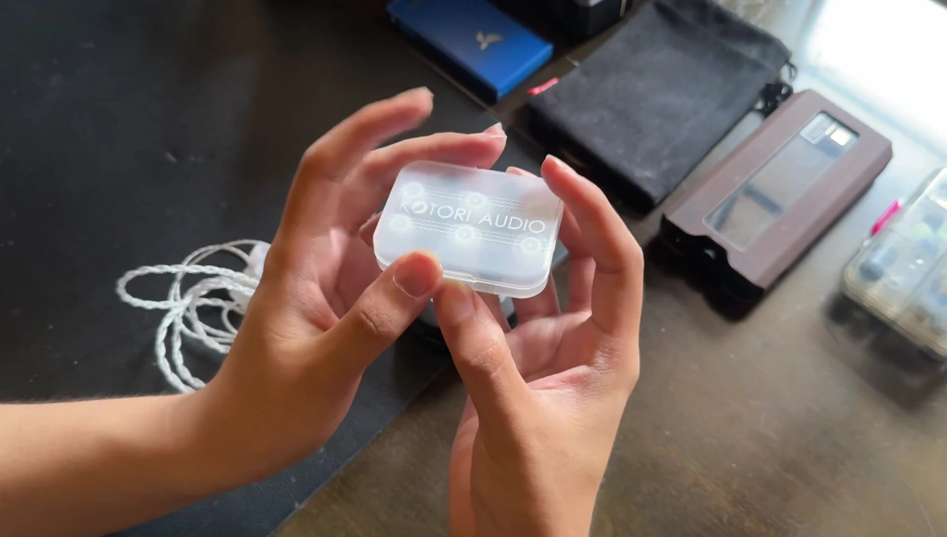 Ear tip case with Kotori Audio branding