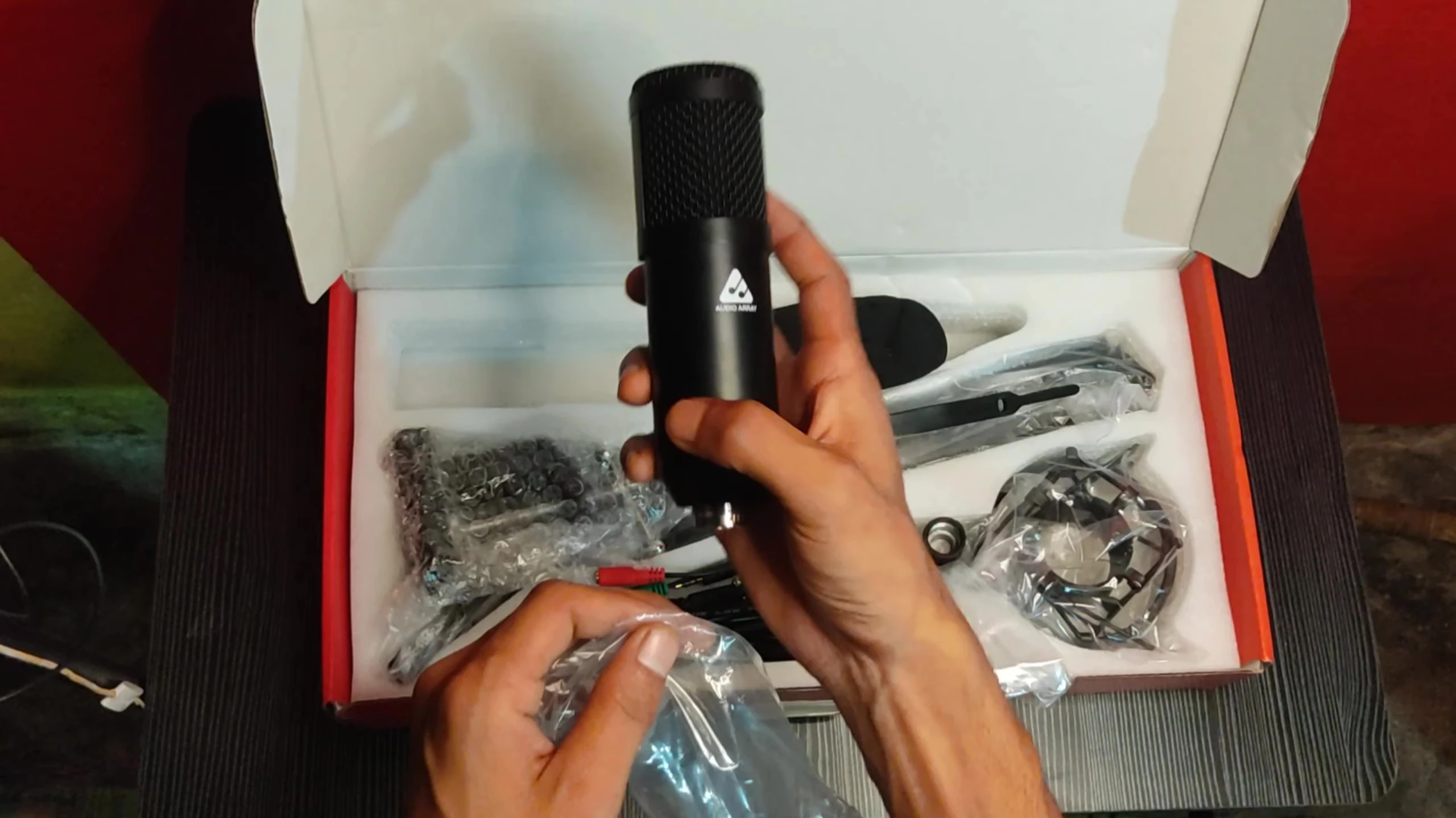 Close-up of the black condenser microphone.
