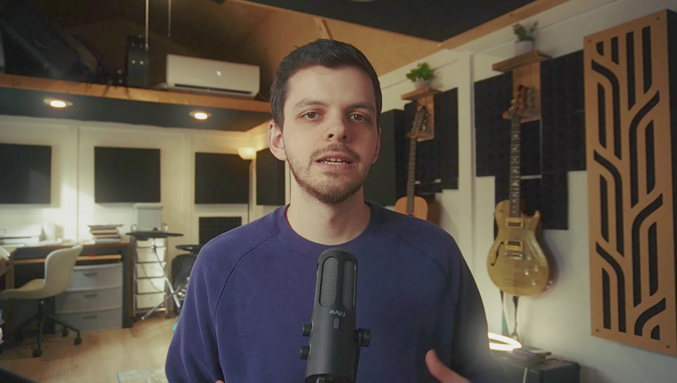 Close-up of the FIFINE Tank 3 microphone, highlighting its sturdy build.