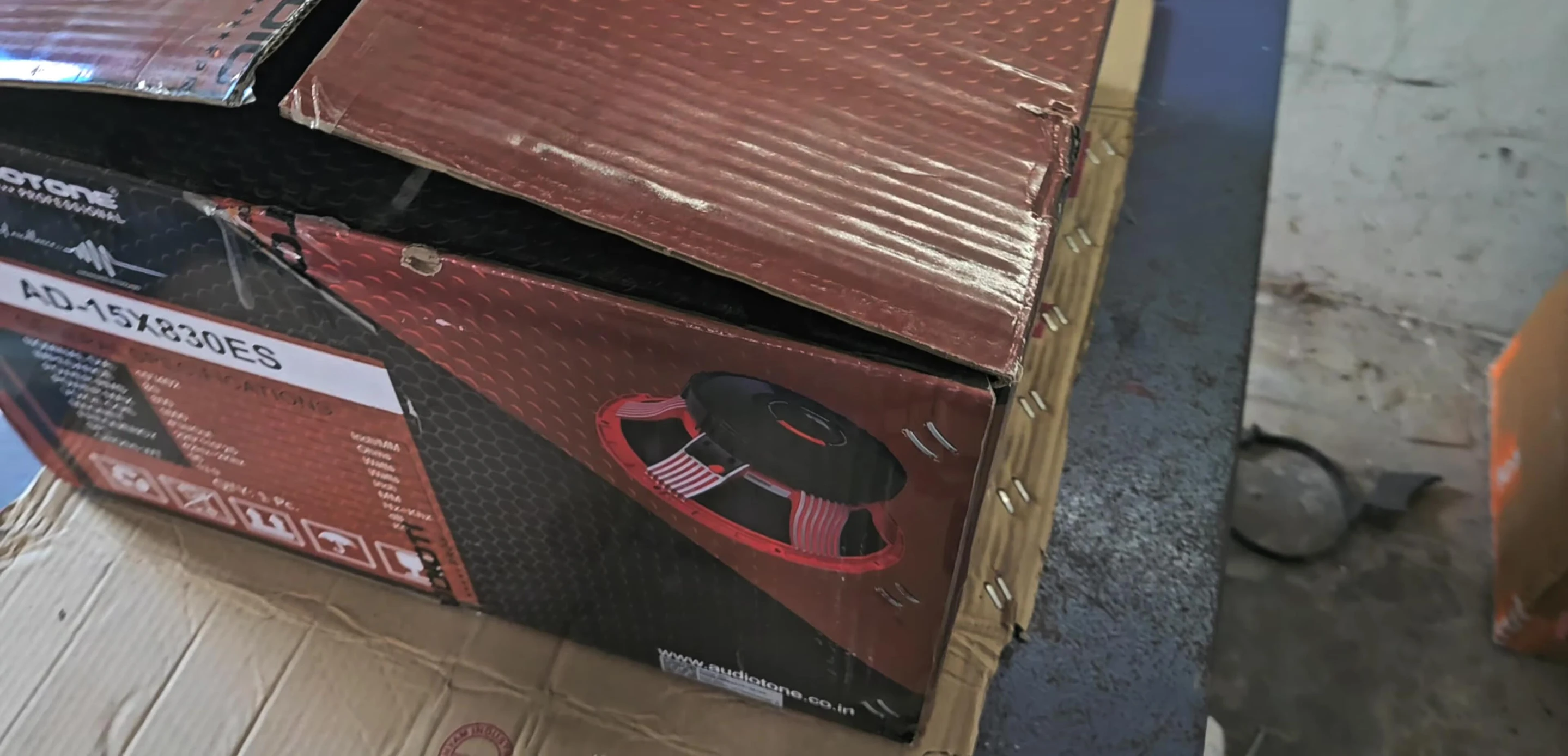 Close-up of the speaker box with specifications.