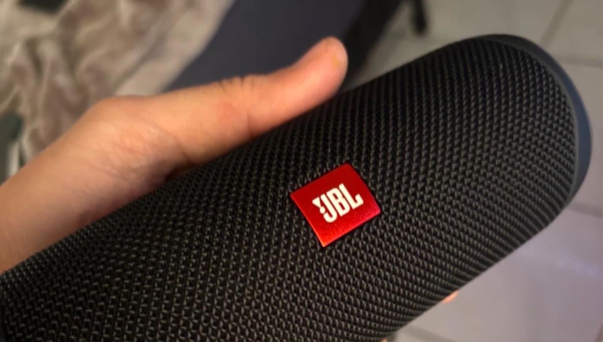 The speaker showcasing its waterproof capabilities.
