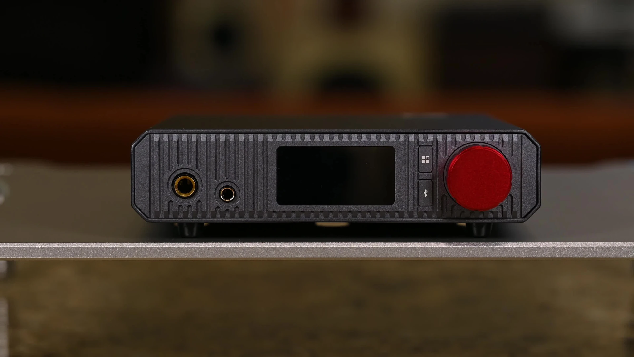 Close-up of the xDuoo XA-02's front panel, showcasing its design and build quality.