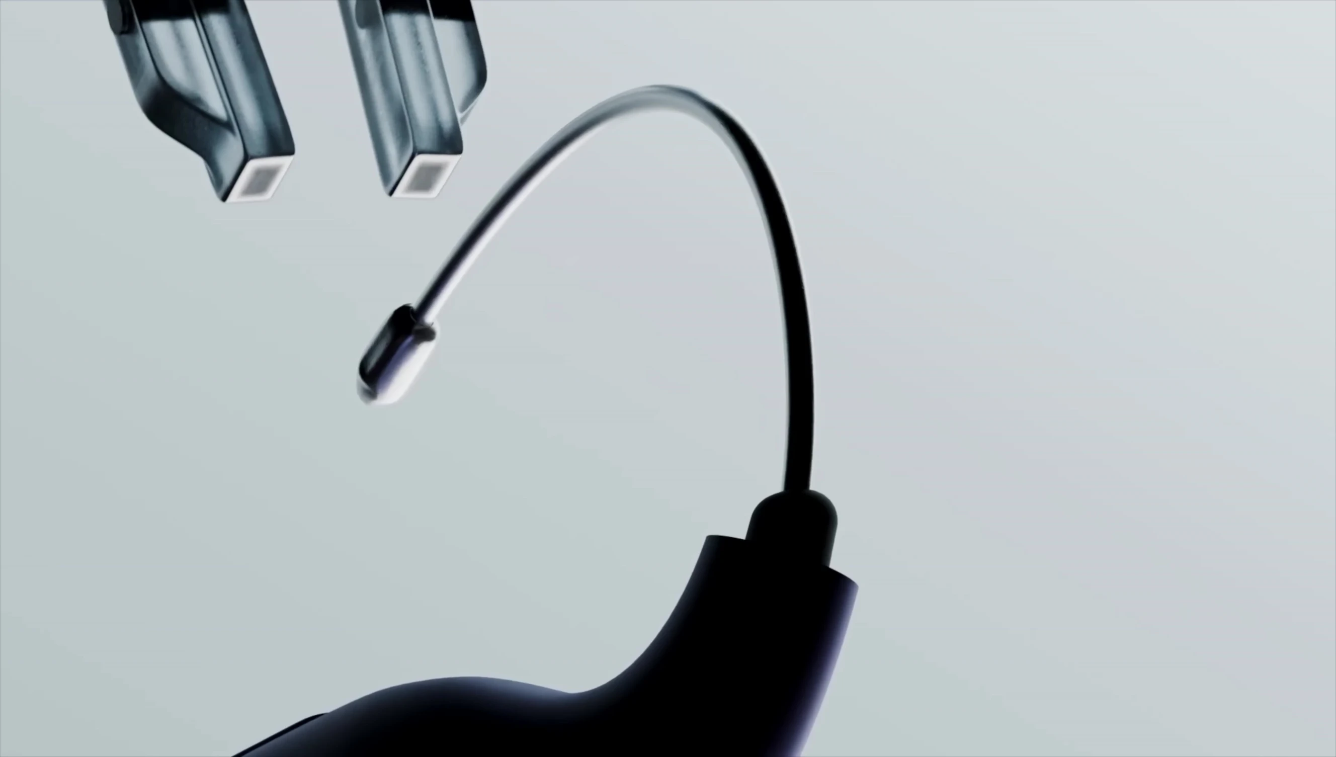 Close-up of the smaller ear hooks and earbud design.
