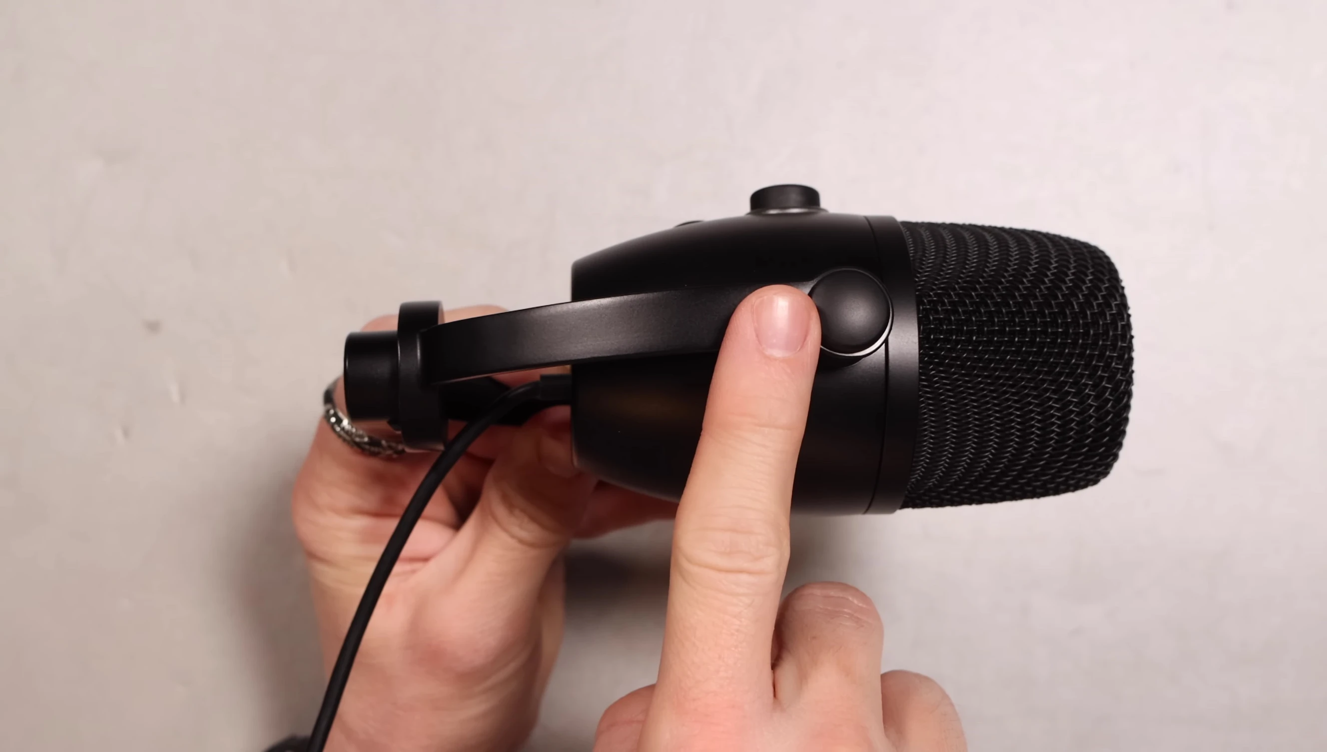 The microphone's mute button and multi-function dial