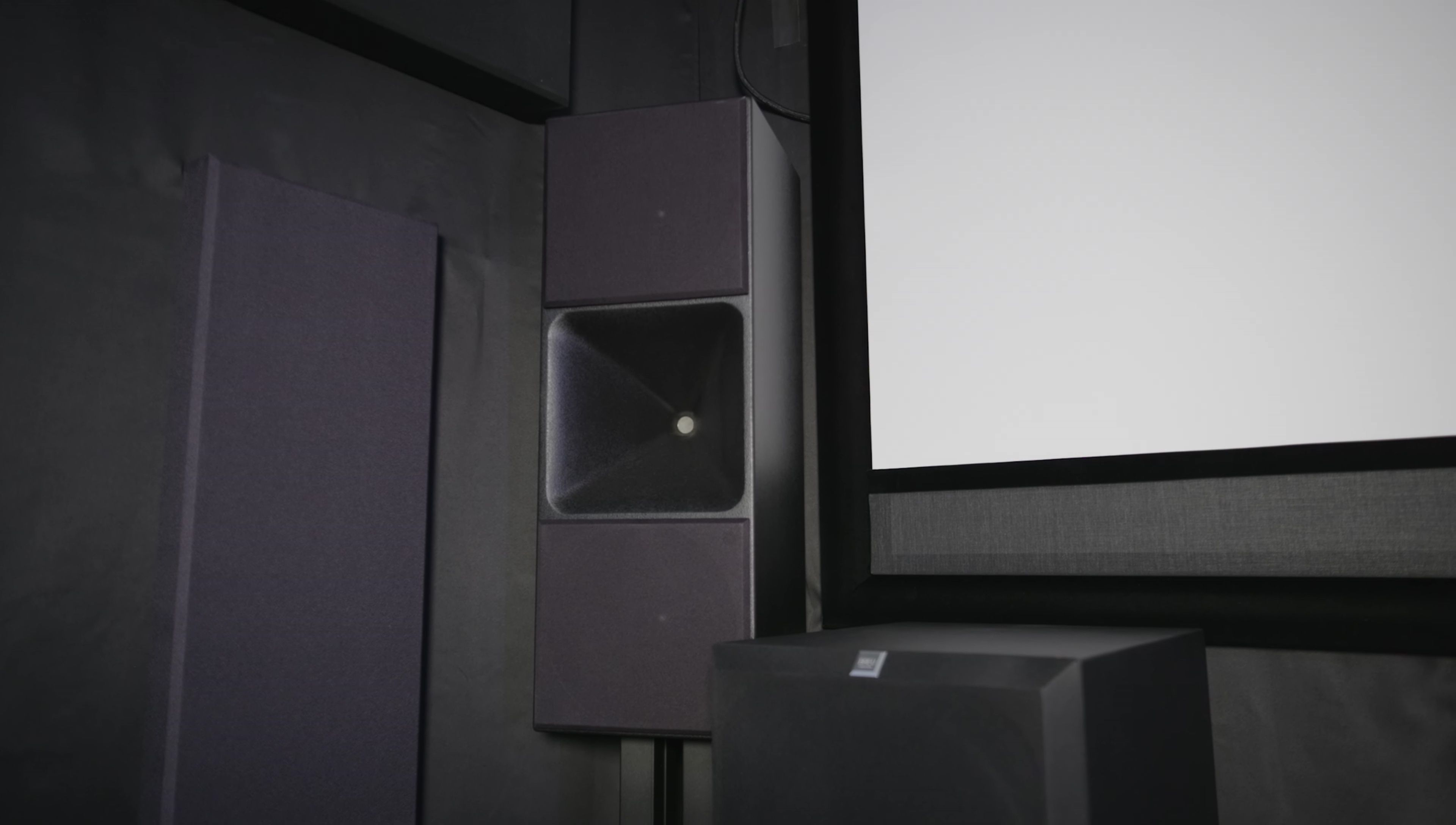 Screen showing a movie scene playing on a home theatre setup.