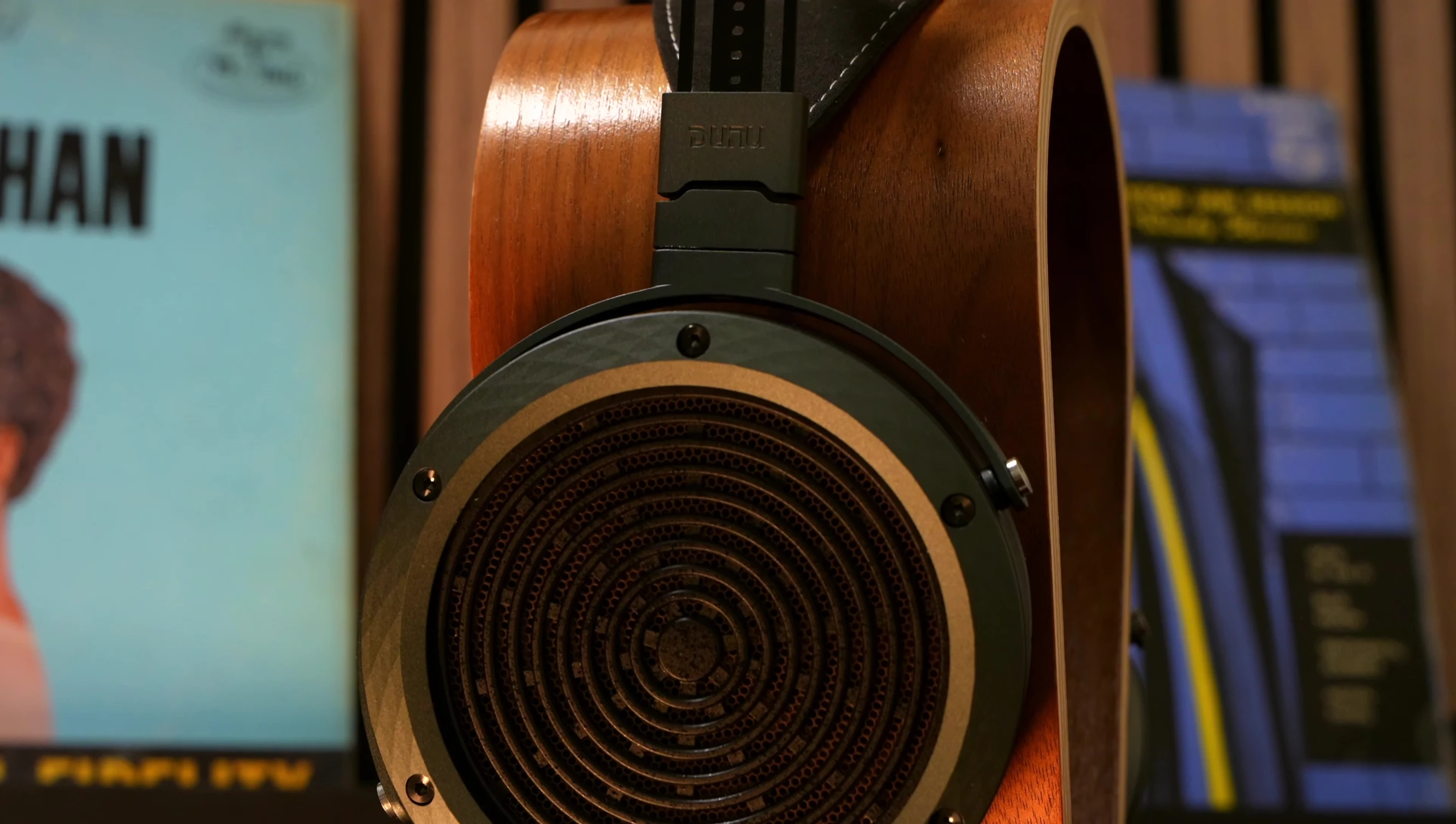 Headphone shown from multiple angles, showcasing its design.
