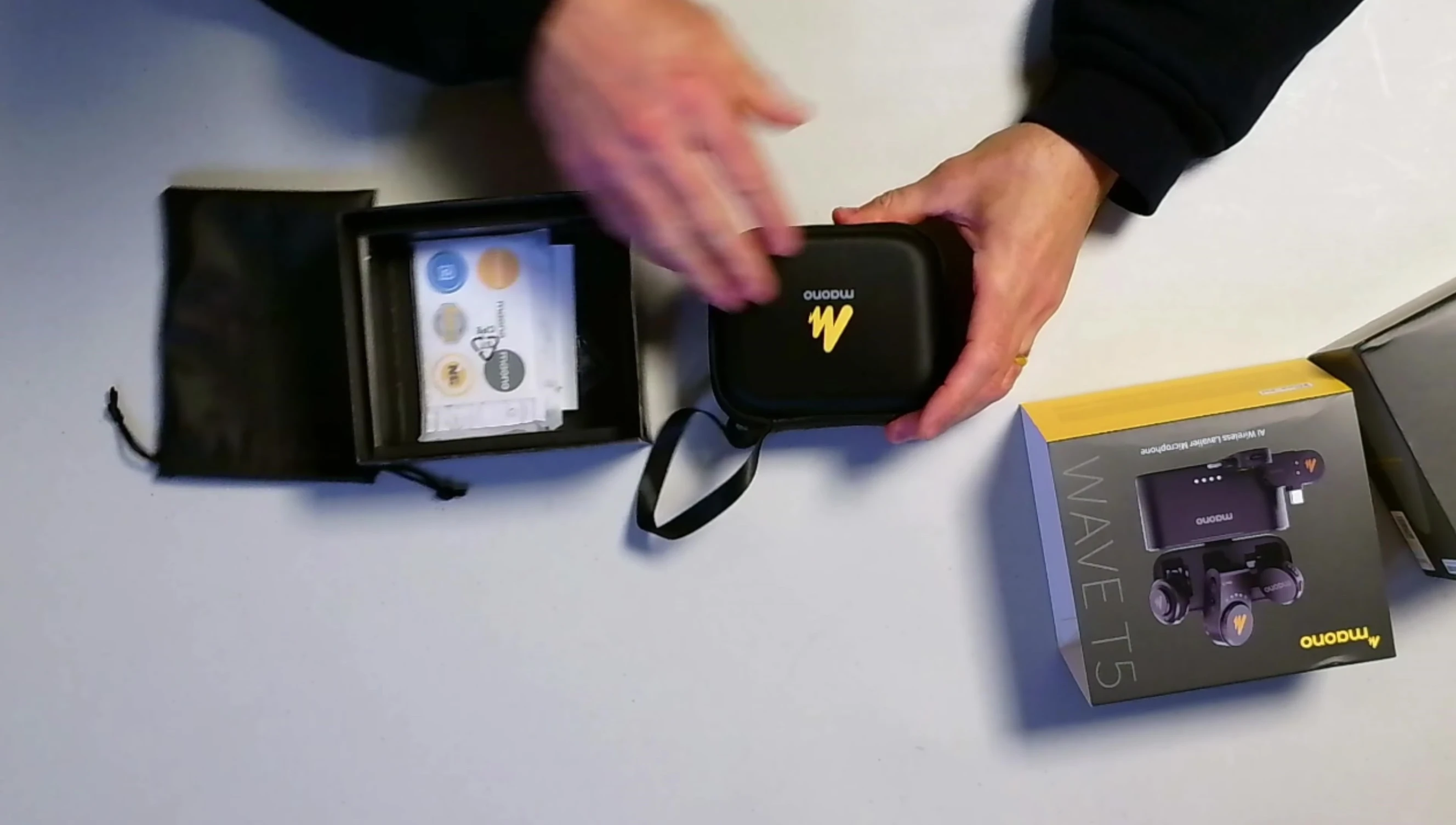 Close-up of the small carrying case and accessories