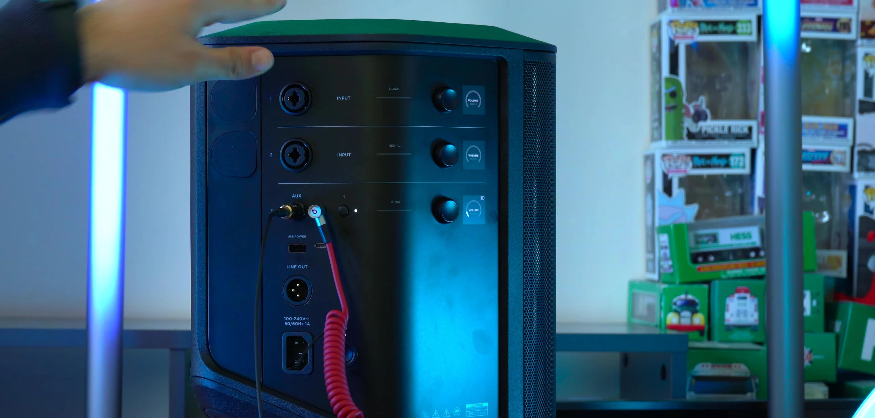 Image showcasing the Bluetooth connectivity and the physical controls on the speaker.