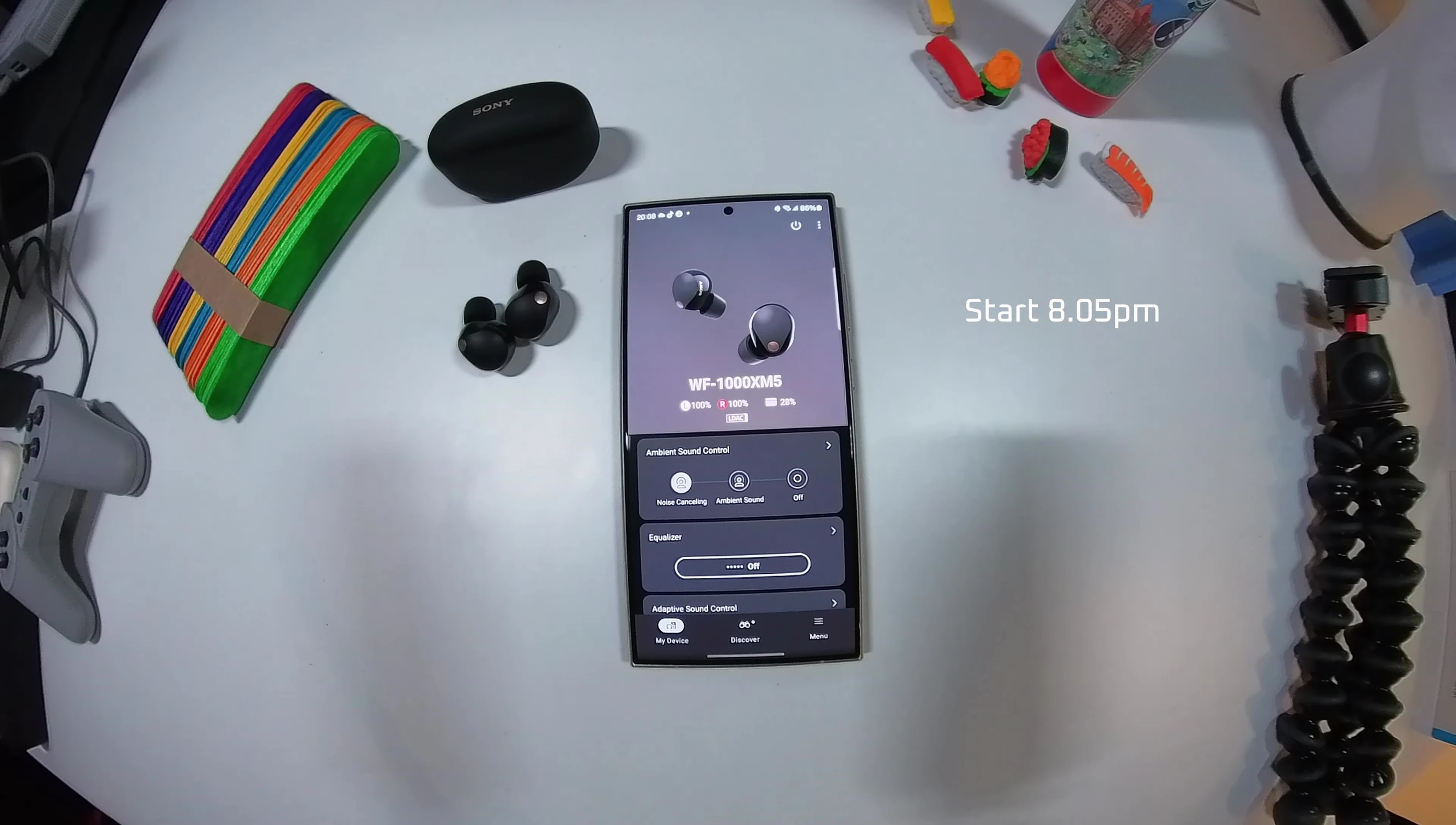 Image of the Sony WF-1000XM5 earbuds undergoing battery life testing.