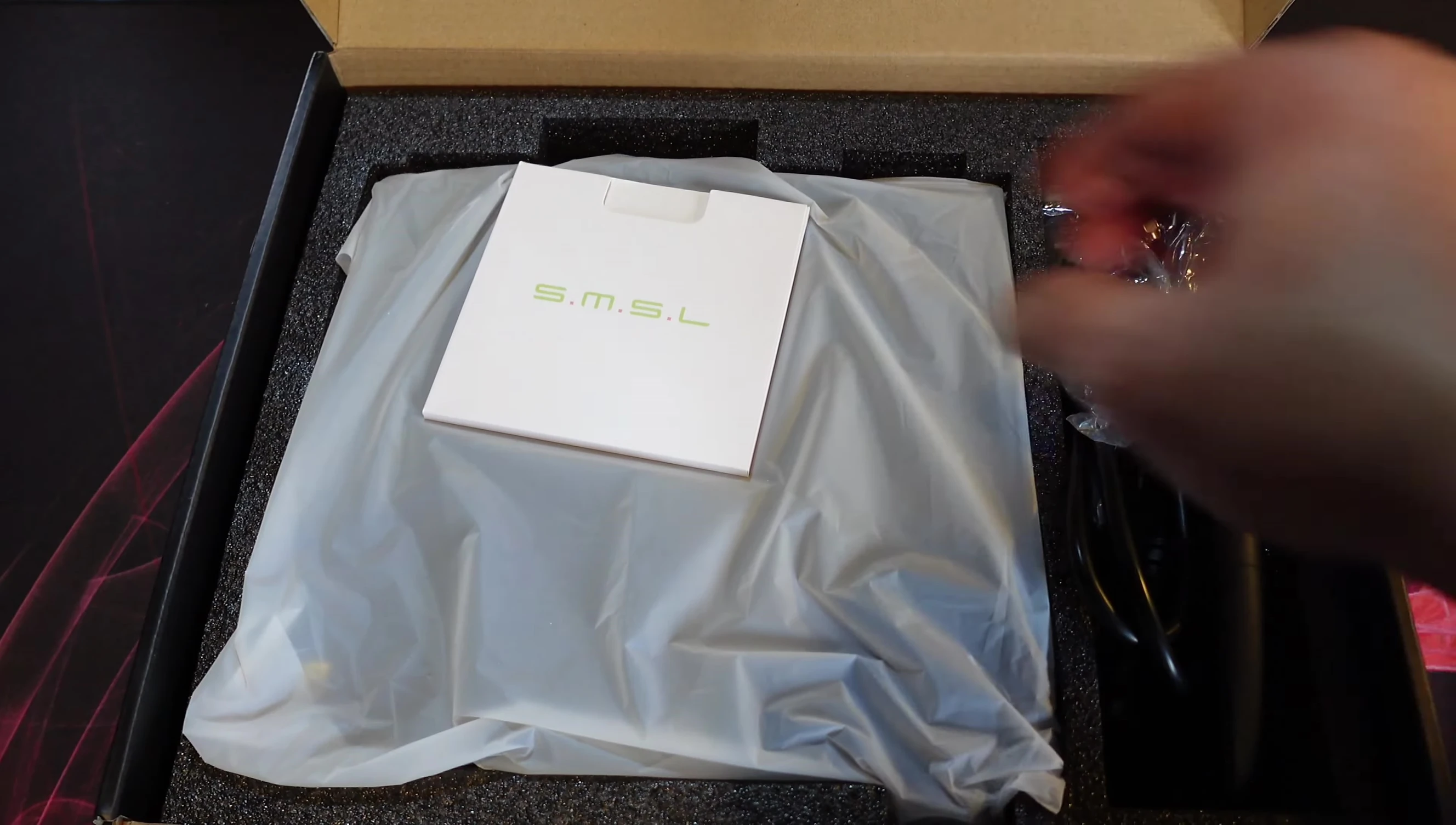 Unboxing the SMSL RAW-HA1, showing the contents and packaging