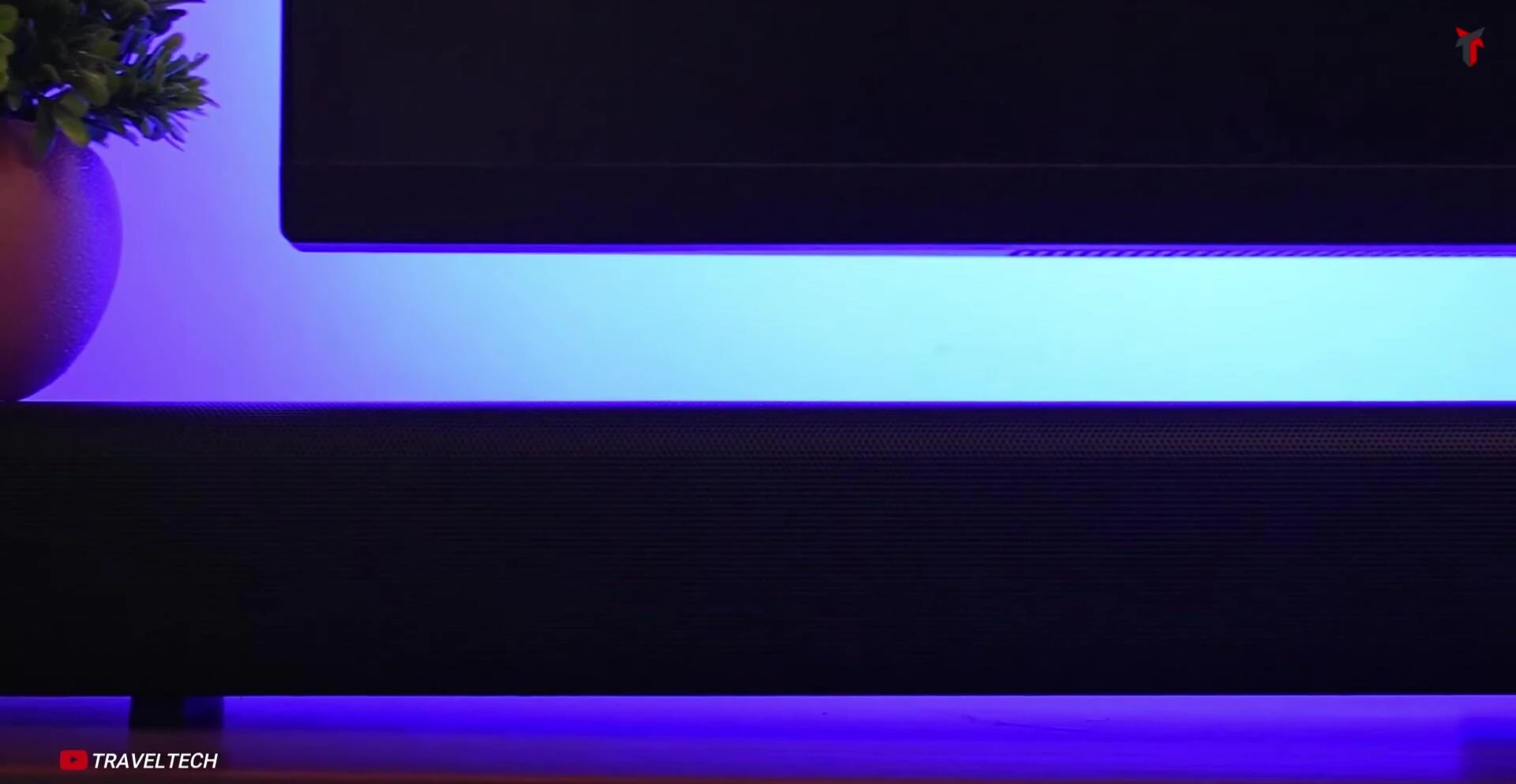 Close-up showcasing the soundbar's design and LED display