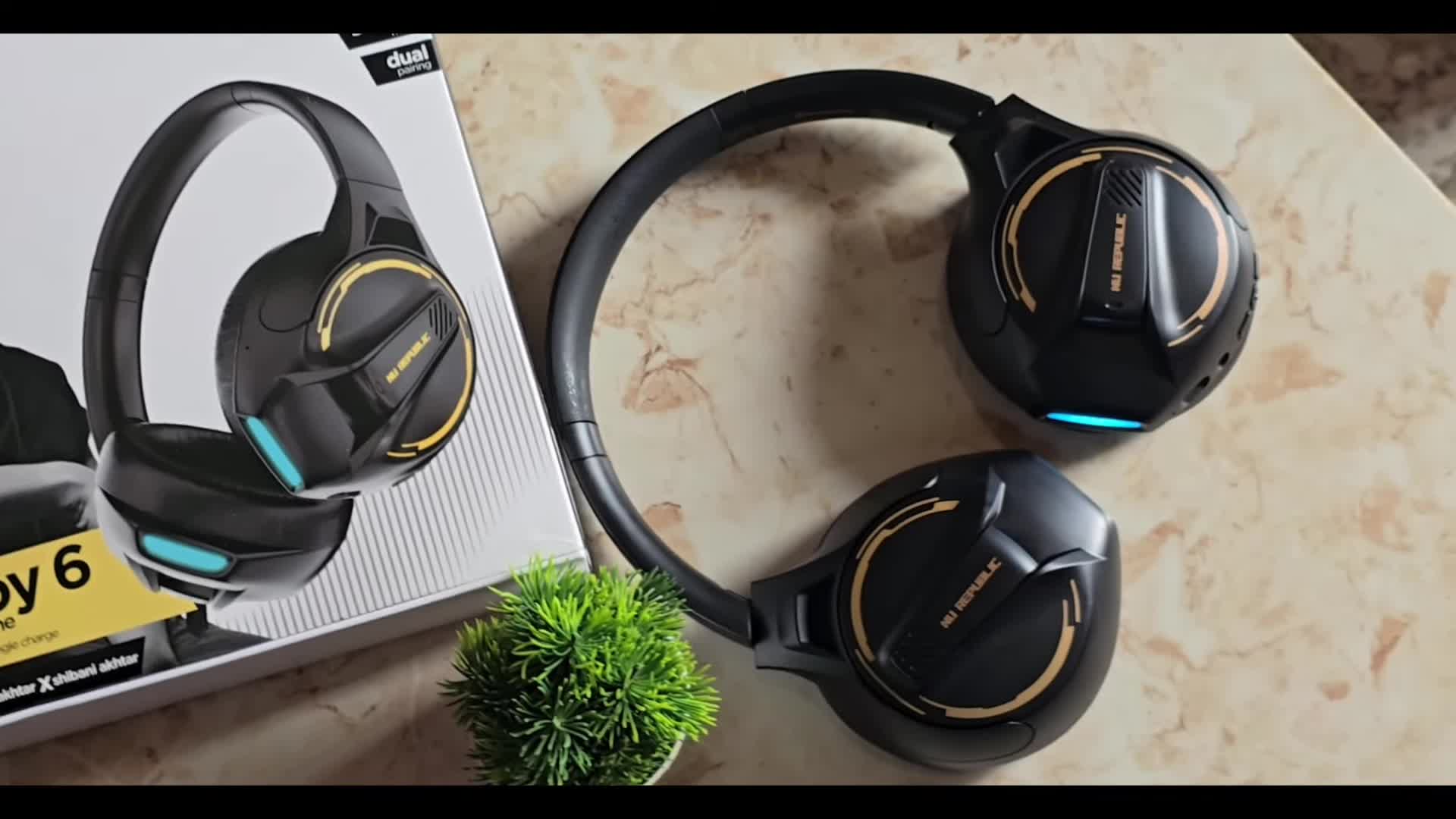 Close-up of the Nu Republic Starboy 6 headphones in their packaging.