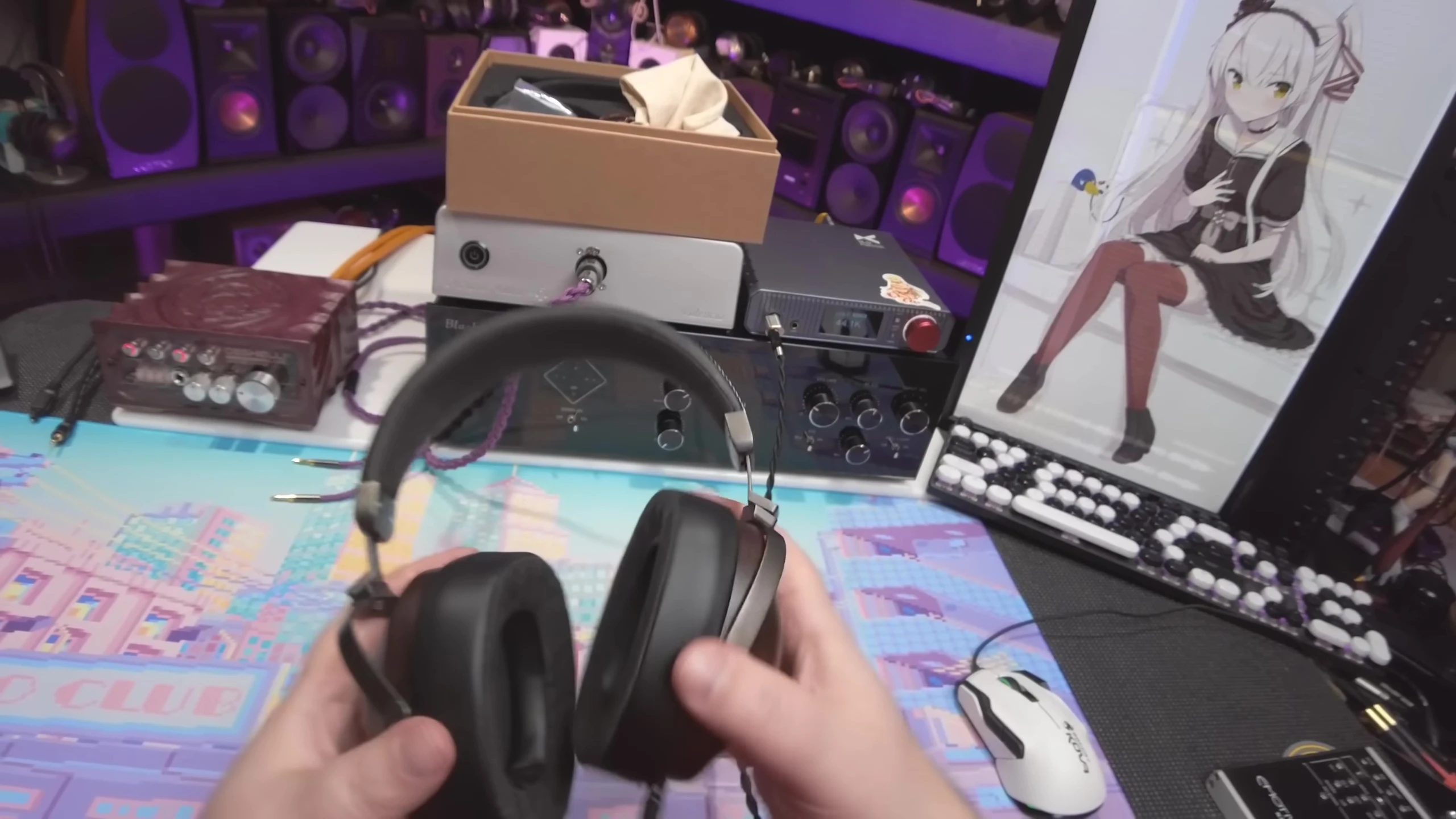 Headphones on the reviewer's head