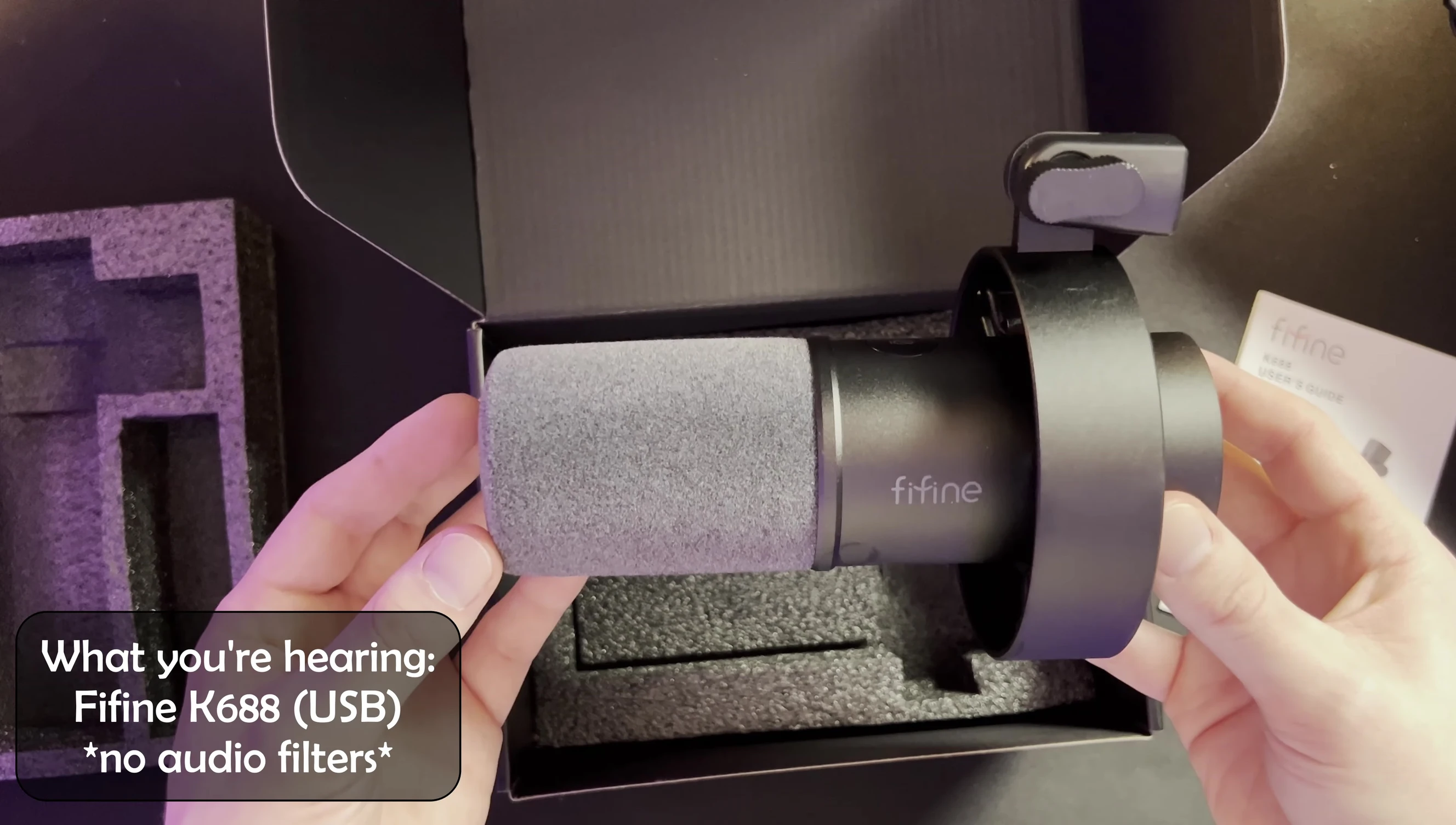 Close-up of the Fifine K688 microphone showing its metal construction.