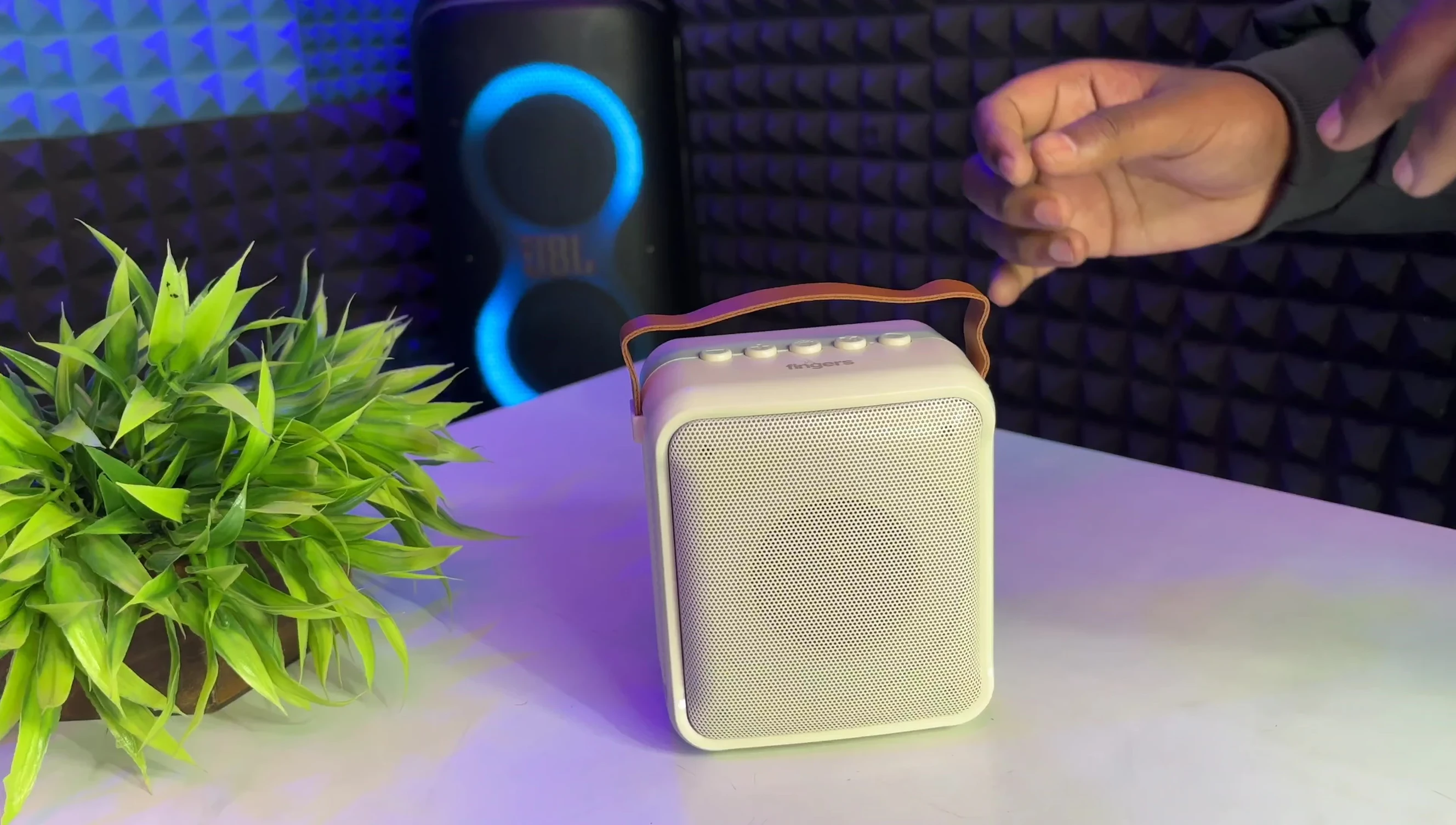 The Fingers Solo speaker turned on, showing the RGB lighting.