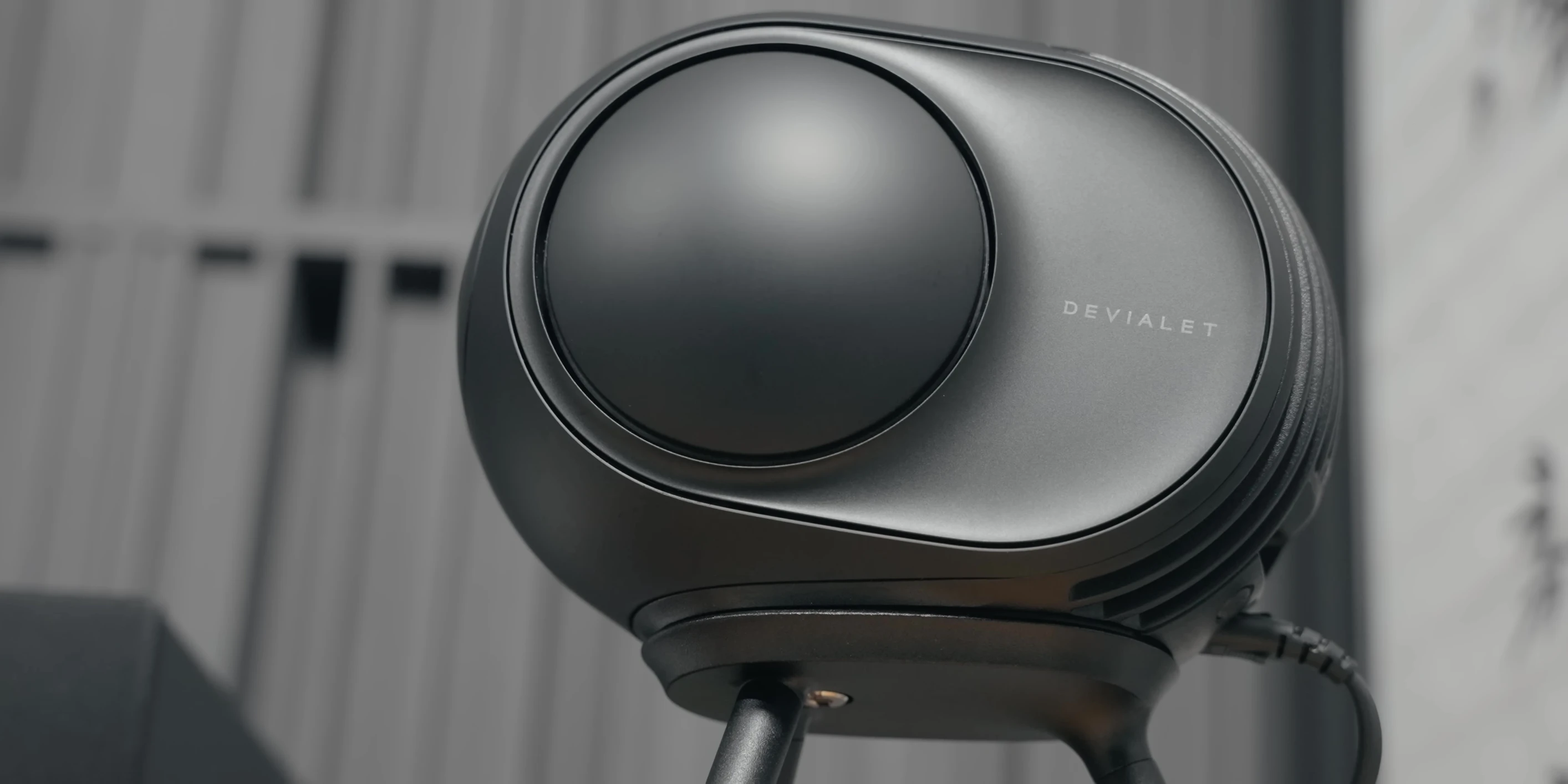 The speaker on a table, showcasing its design