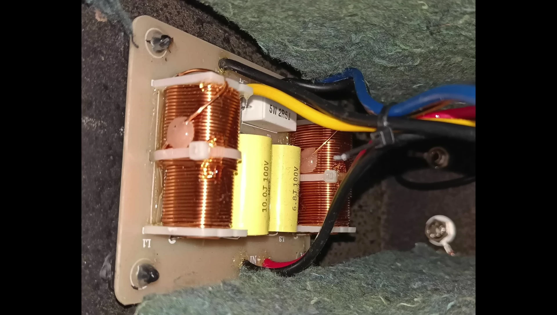 Image showcasing the speaker's crossover components.